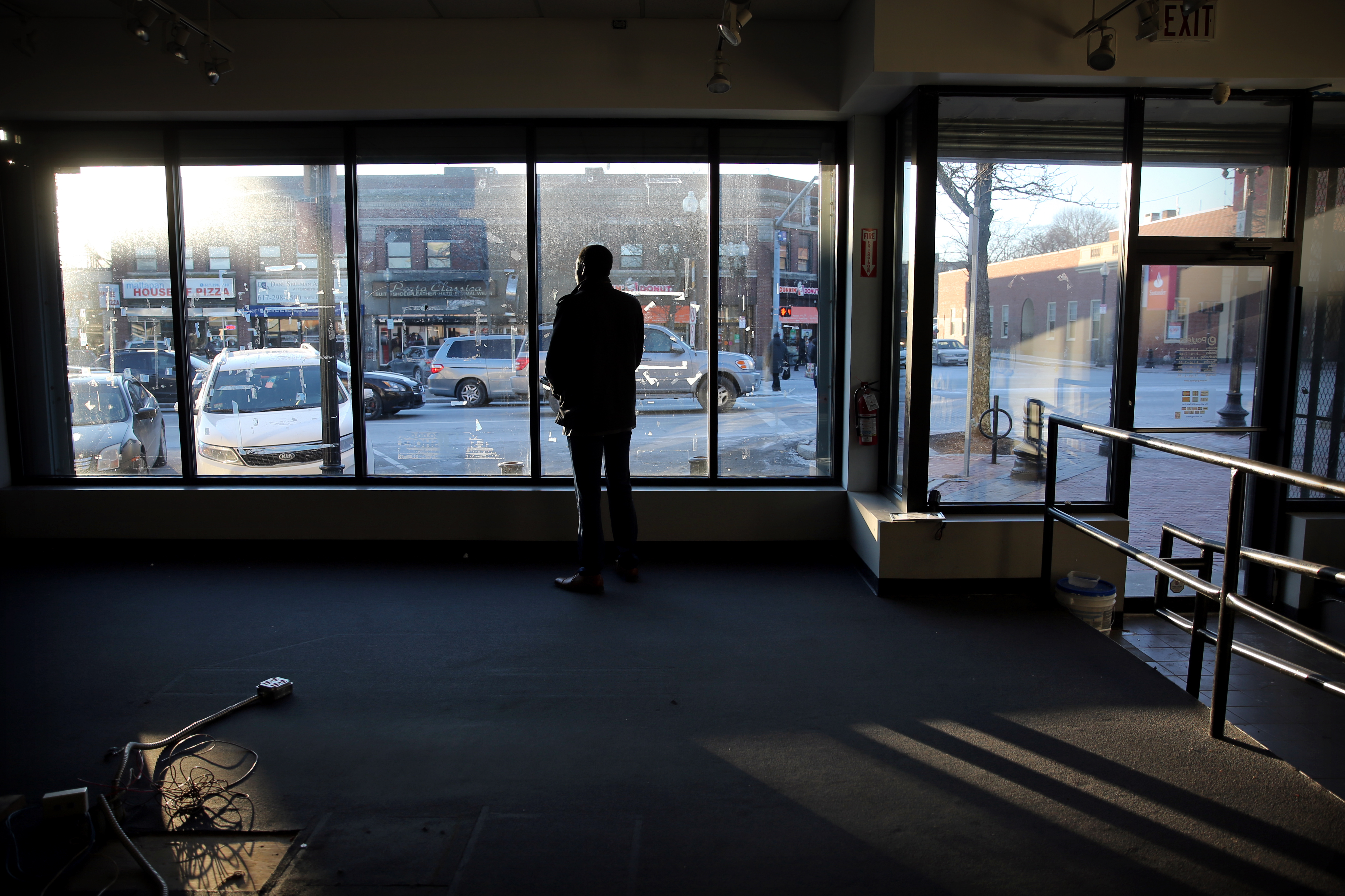 Chauncy Spencer stood in the space — a former Payless shoe outlet — where he hopes to open his marijuana store.