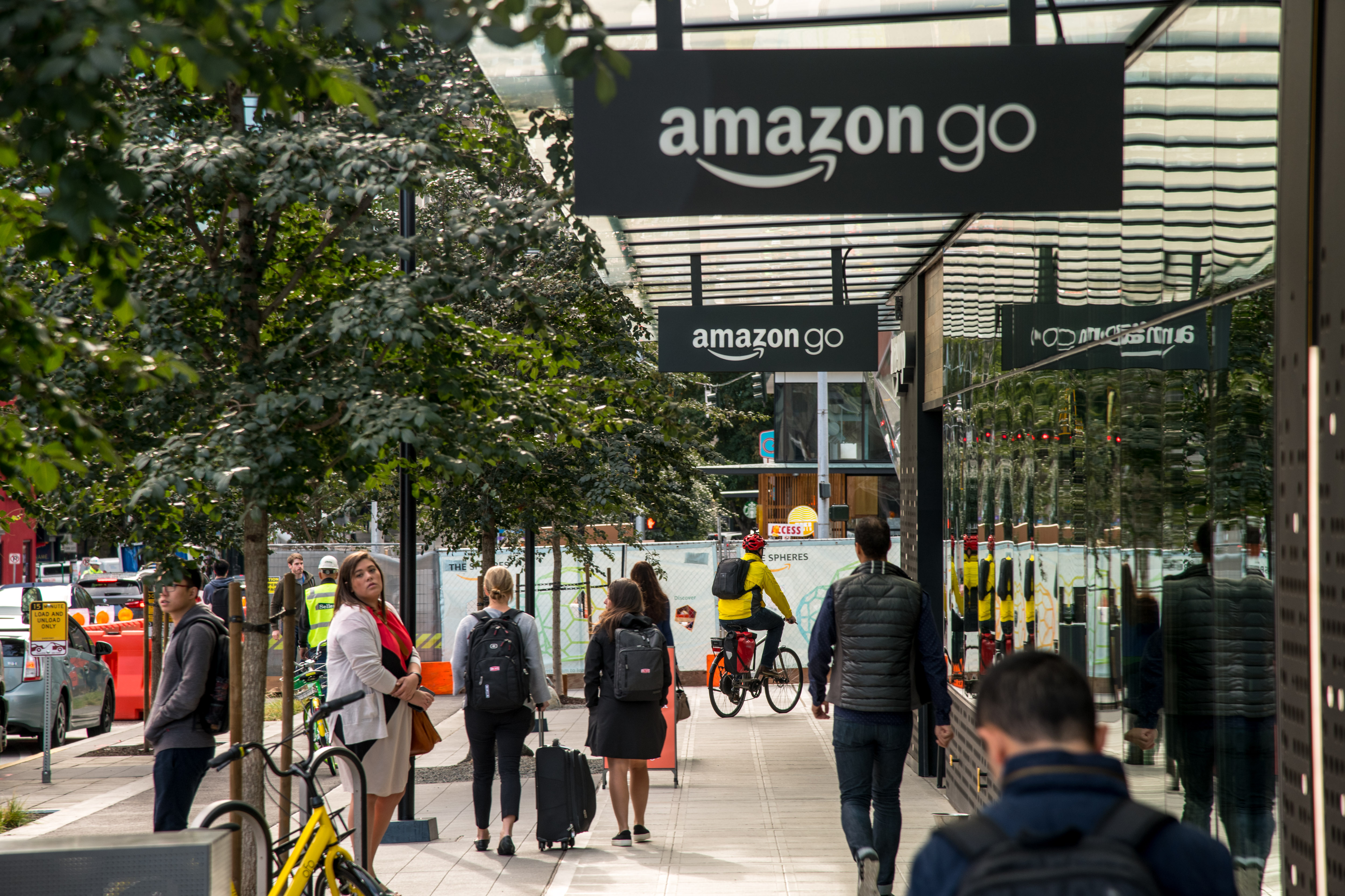 Pedestrians passed an Amazon Go store.