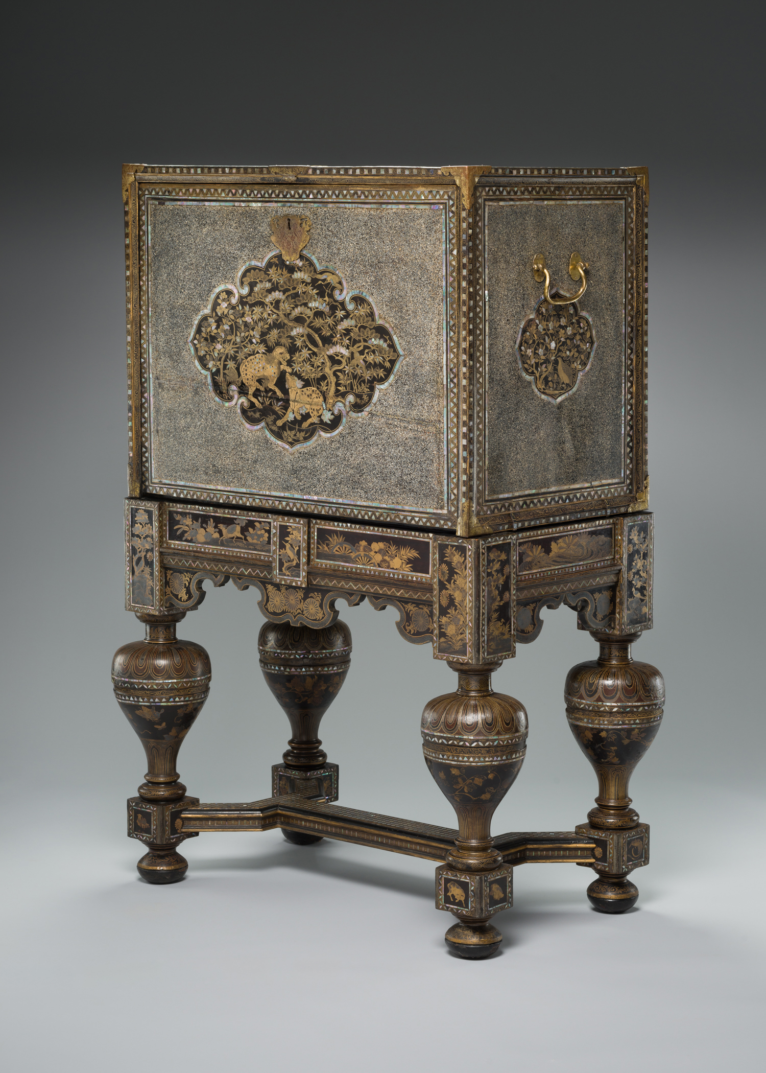 A cabinet on stand from Japan.
