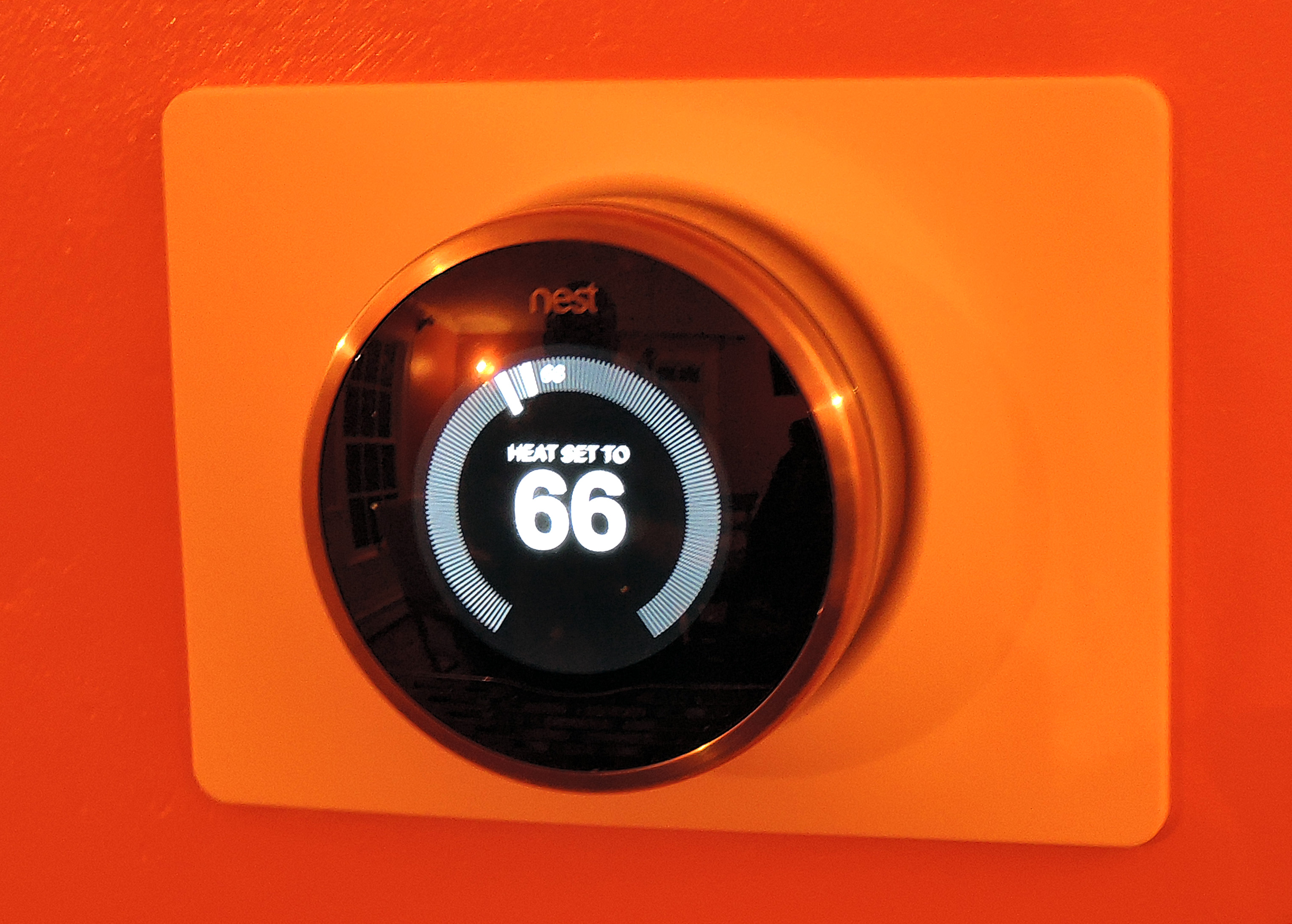 Mark and Dolly DeNyse of Hingham can use their smartphones to control their Nest Learning Thermostat, but it knows when they are home and delivers hot or cold air only when needed.