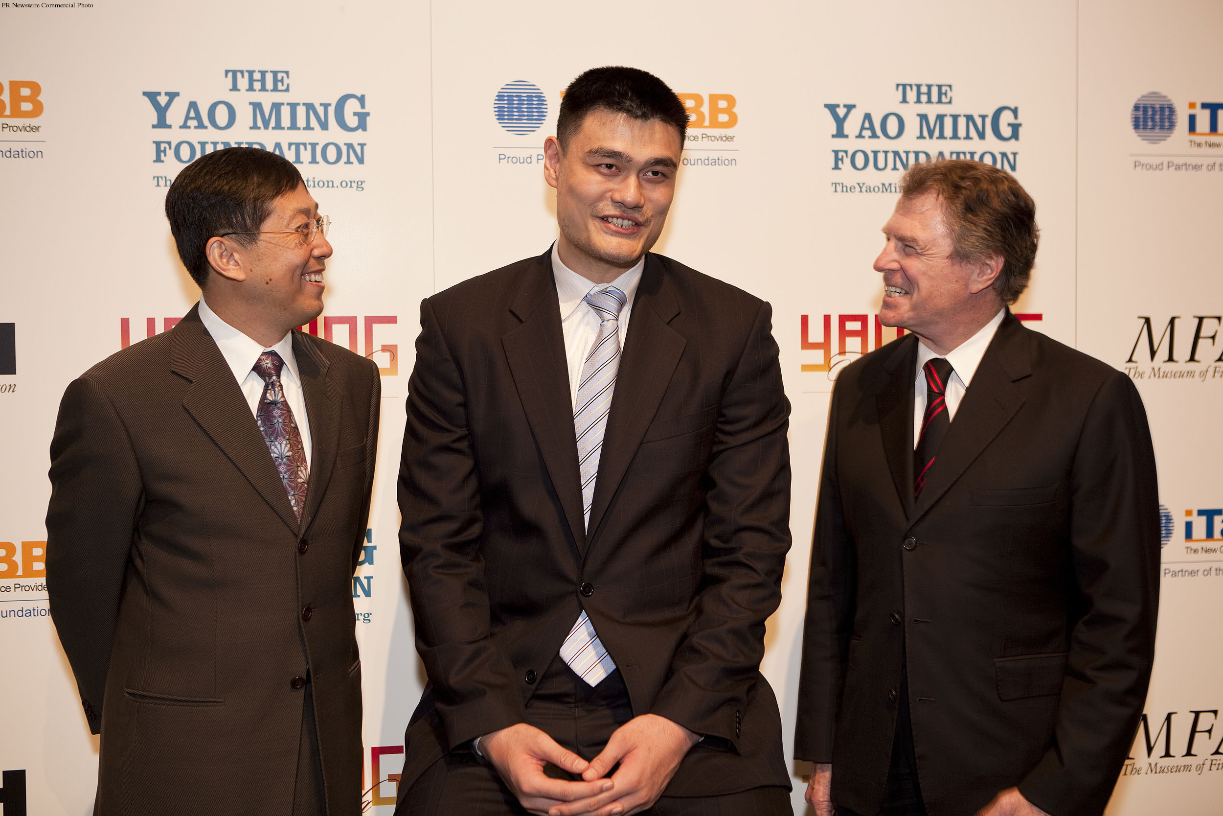 Jack Zhao, CEO of iTALK BB Global Communications (left,) Yao Ming, and Dr. Peter Marzio, MFAH director in 2010 during an annoucement about the Houston Rockets partnership with the Museum of Fine Arts in Houston.