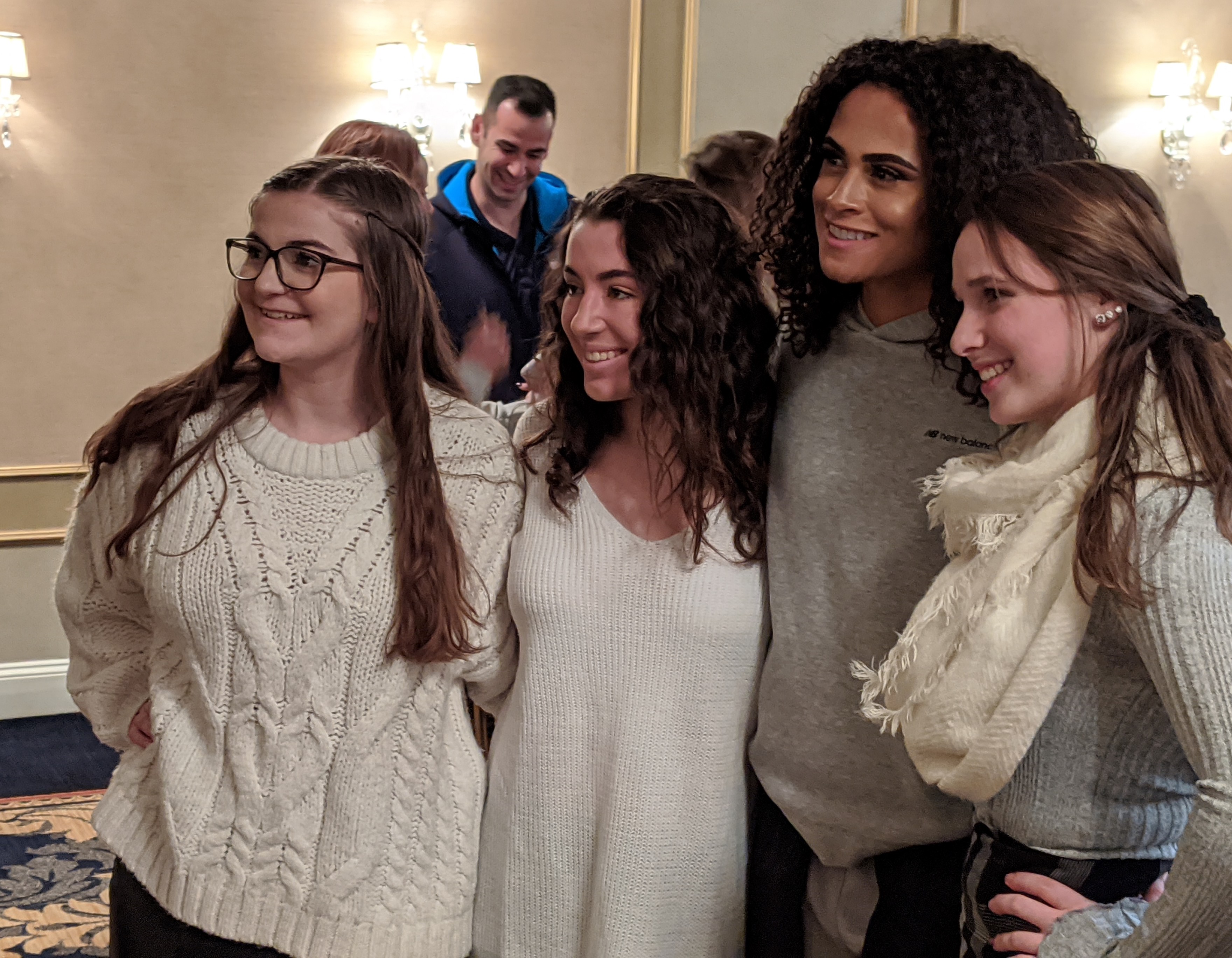 Sydney McLaughlin (second from right) poses with fans from franklin High.