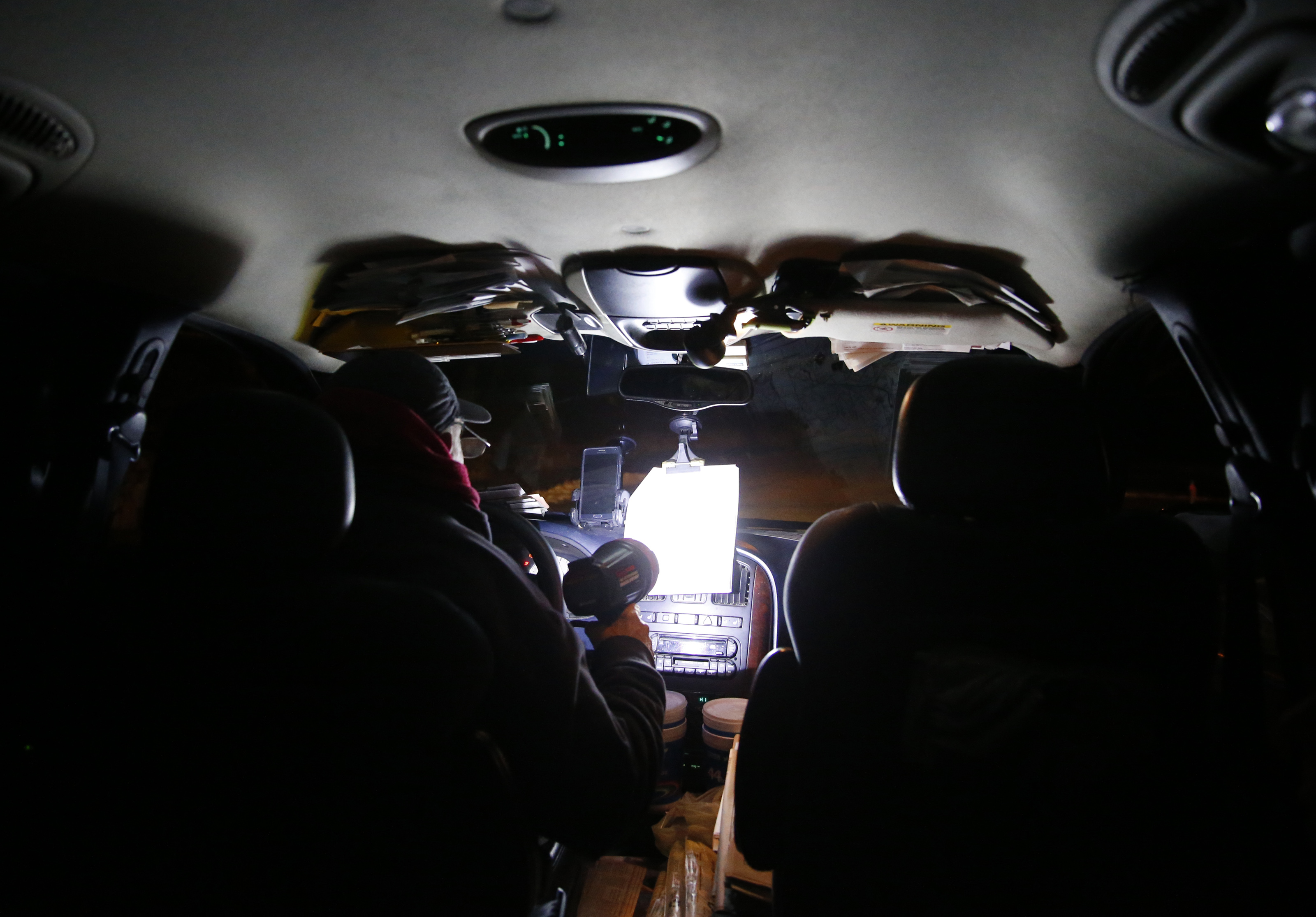 Juiliani, trying to find a location on his route, sat in his vehicle at 4:57 a.m. on a recent morning.
