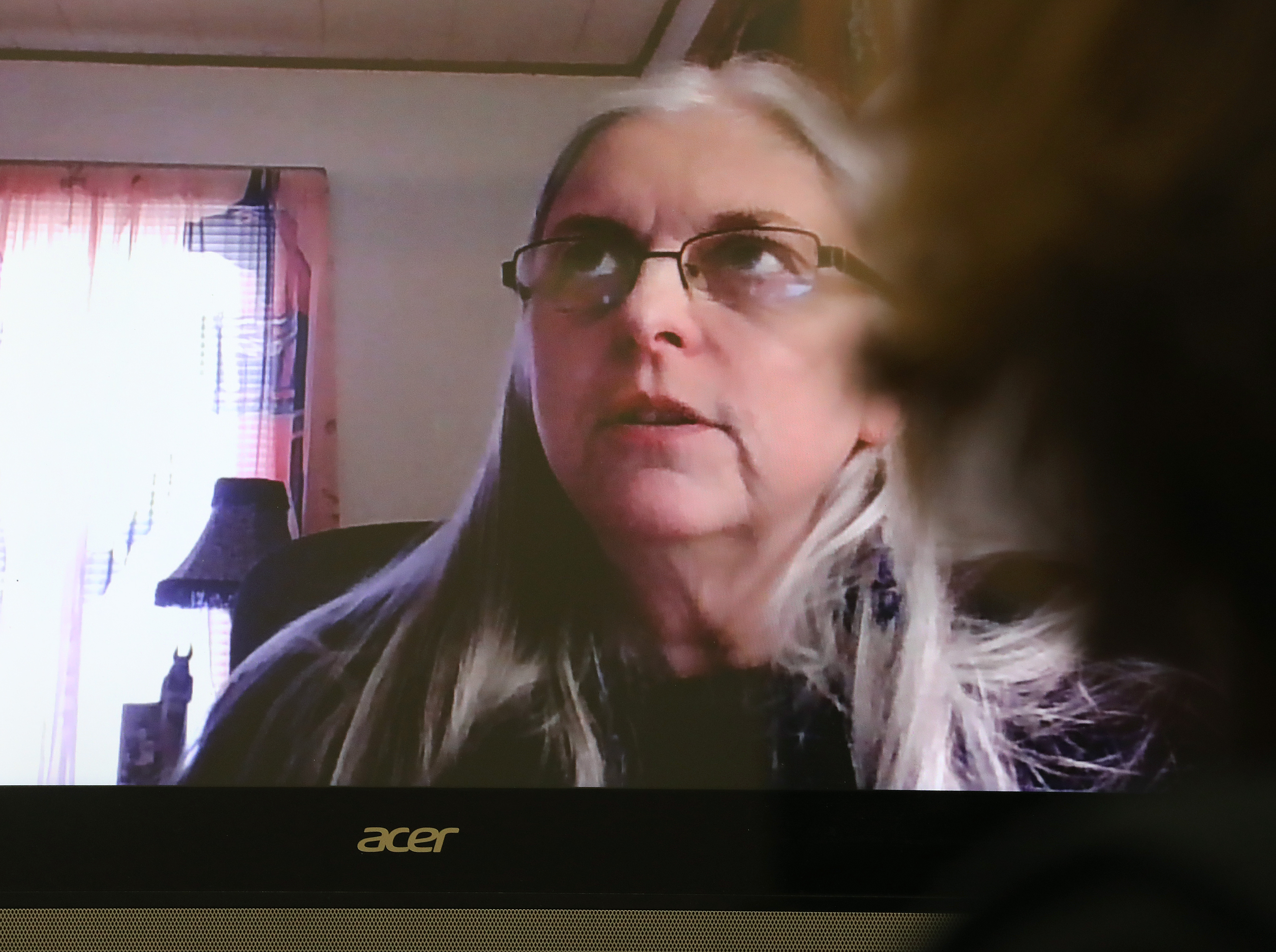 Leslie Matilainen, seen on monitor, conducted a counseling session.