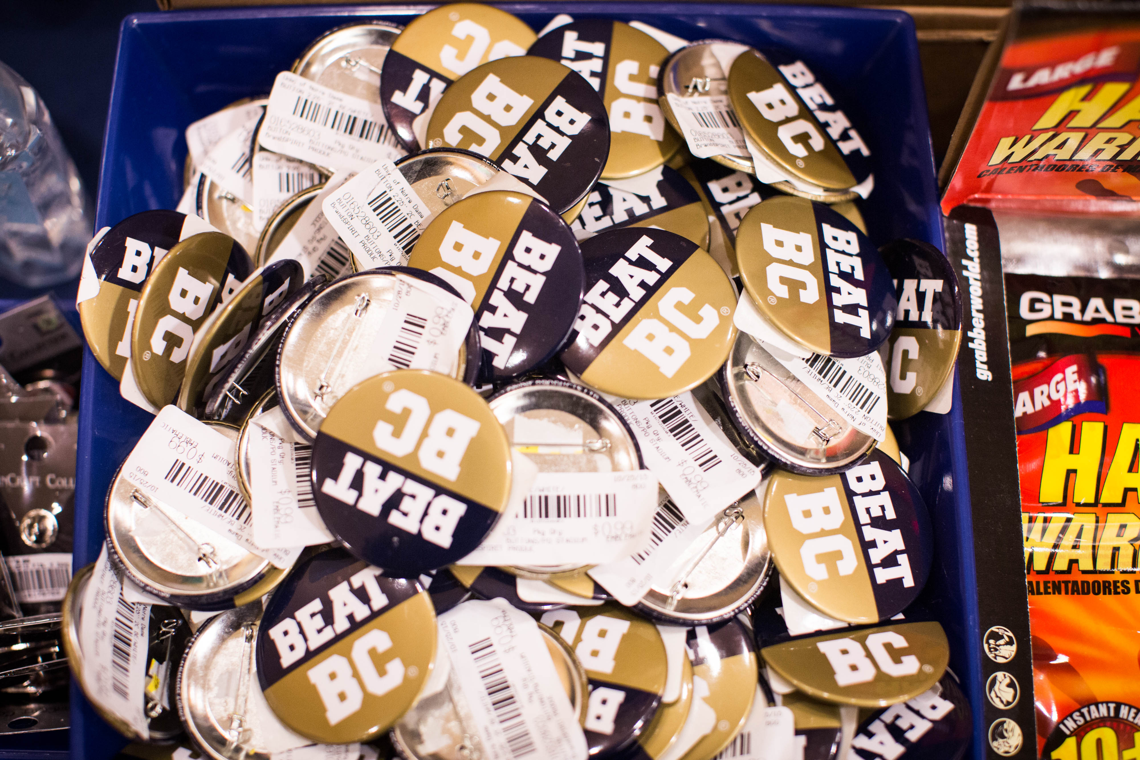 Buttons promoting the Notre Dame game against Boston College.
