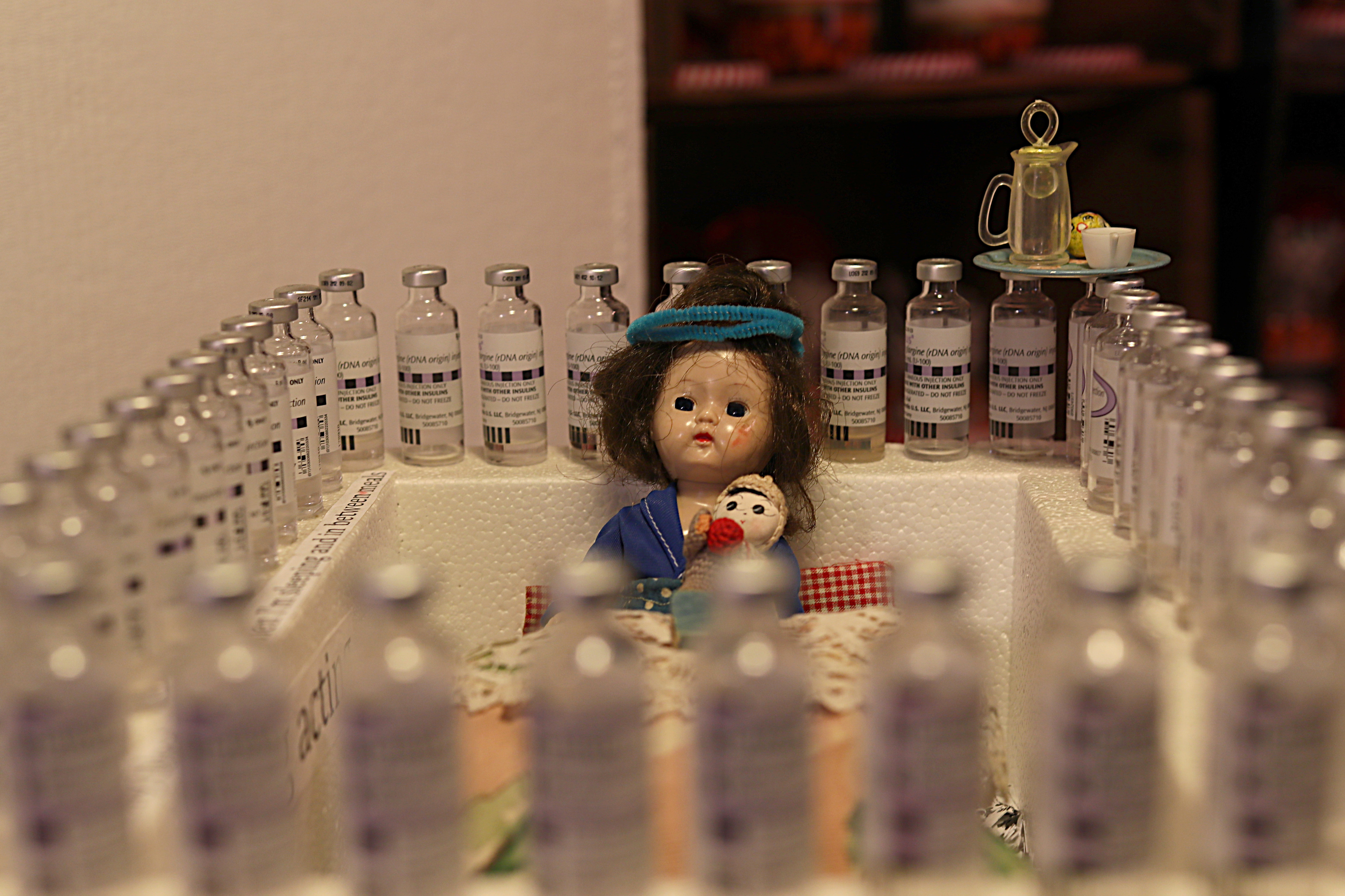 Hundreds of insulin vials, which each cost hundreds of dollars and last less than a month, line the display’s in Fay’s basement.