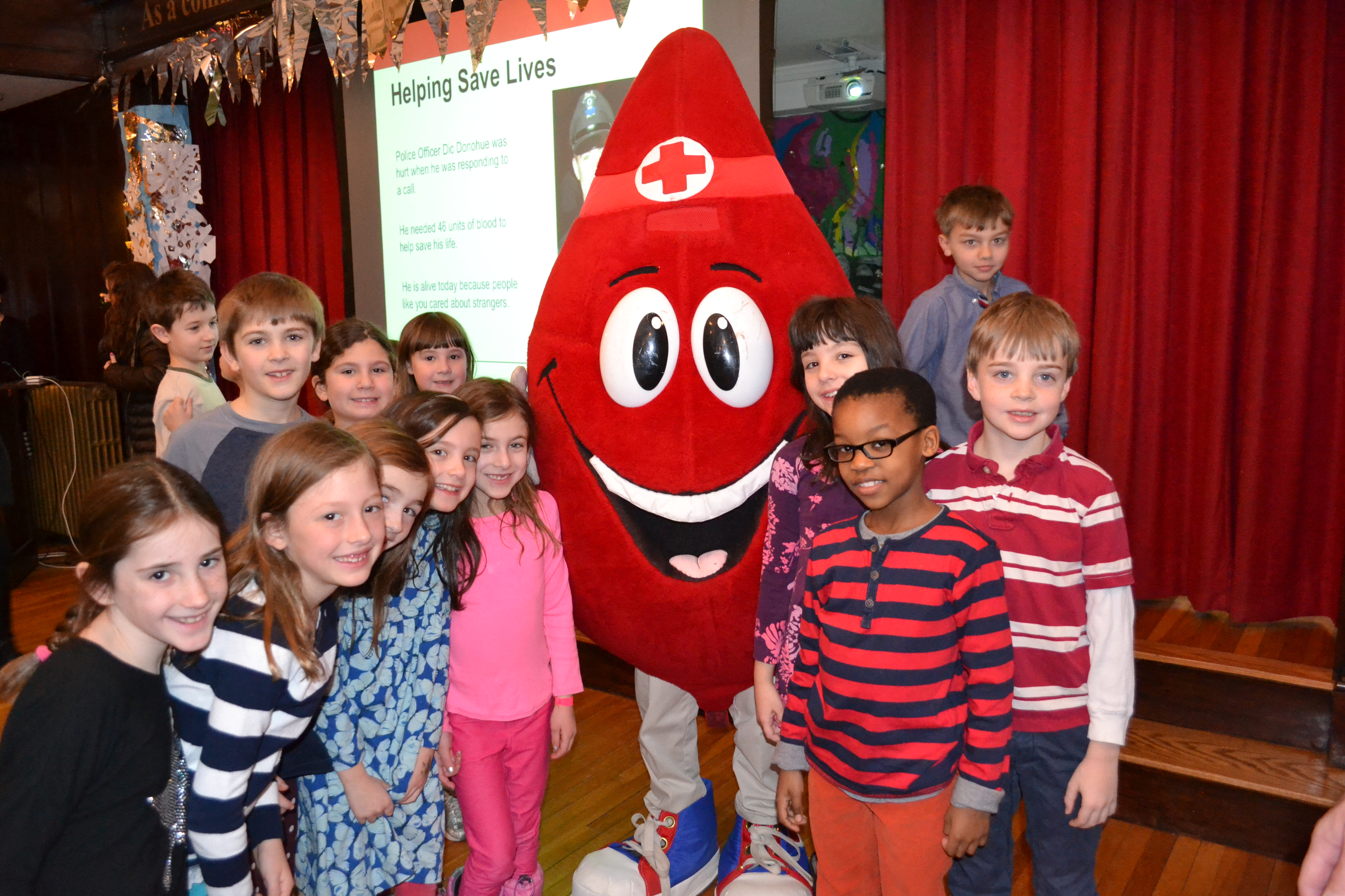 Buddy the Blood Drop spent quality time with Tenacre Country Day School students before a blood drive last year. A similar drive at the school is planned for March 1.
