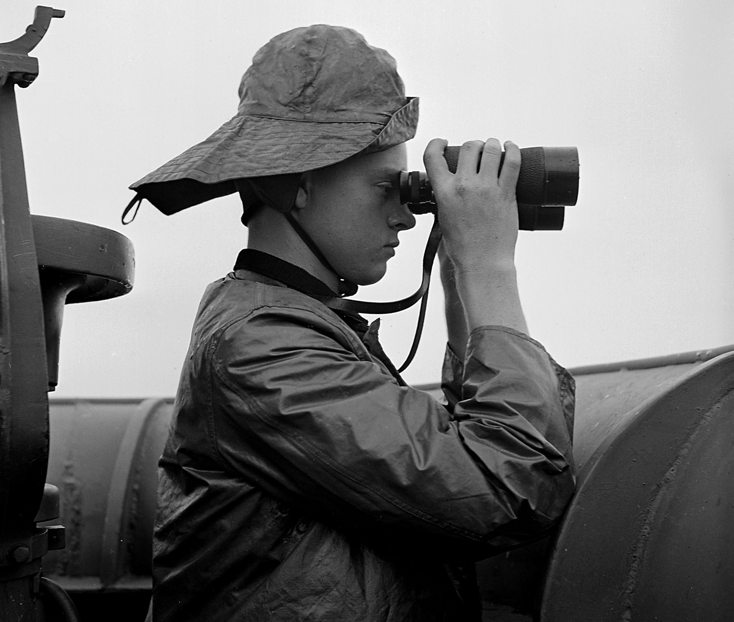 Lieutenant Wayne Miller’s ‘‘Lawrence Britton on duty at prow aboard USS Nassau near Pearl Harbor, Hawaii.’’