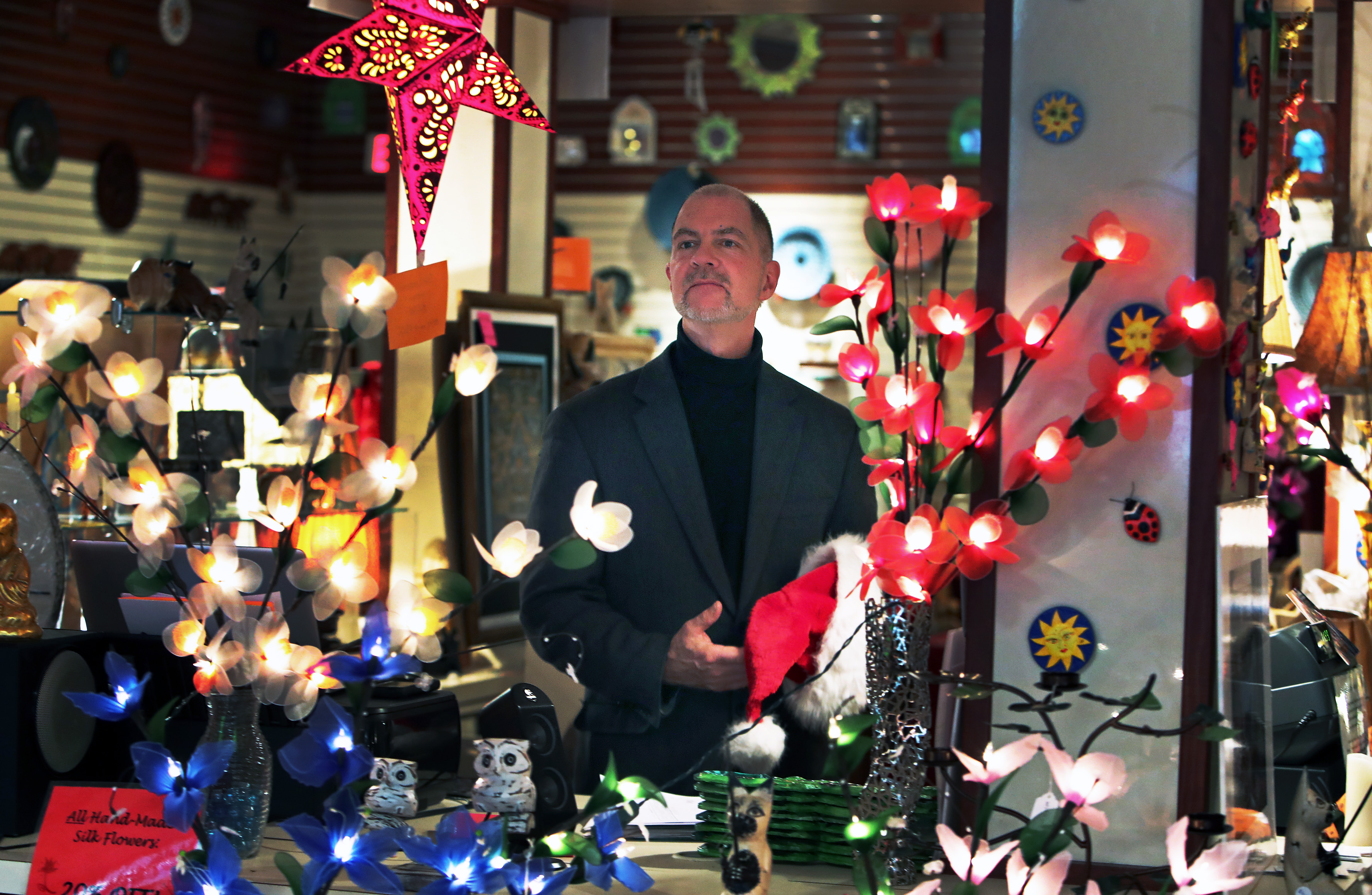 Paul Swope in his store “A World Apart” located in the Mall of New Hampshire.