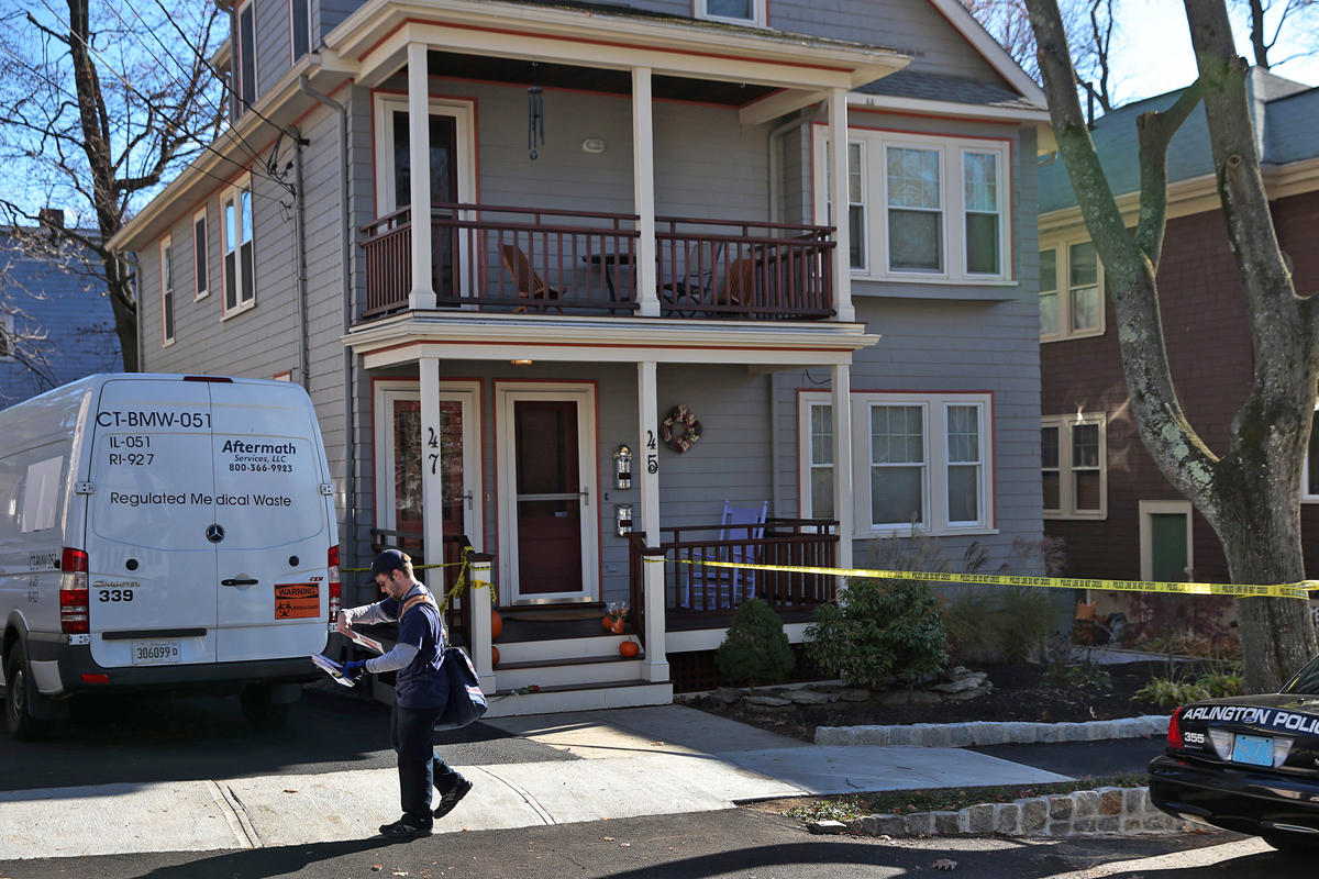 A mailman finished a delivery Tuesday near the scene where the bodies of family in Arlington were discovered.