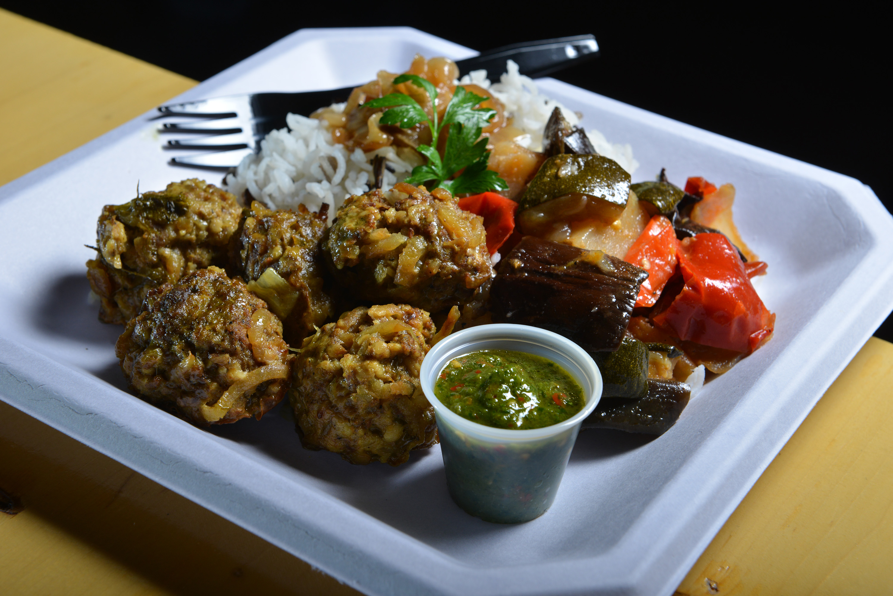 Bonapita’s meatball plate with rice and roasted vegetables.