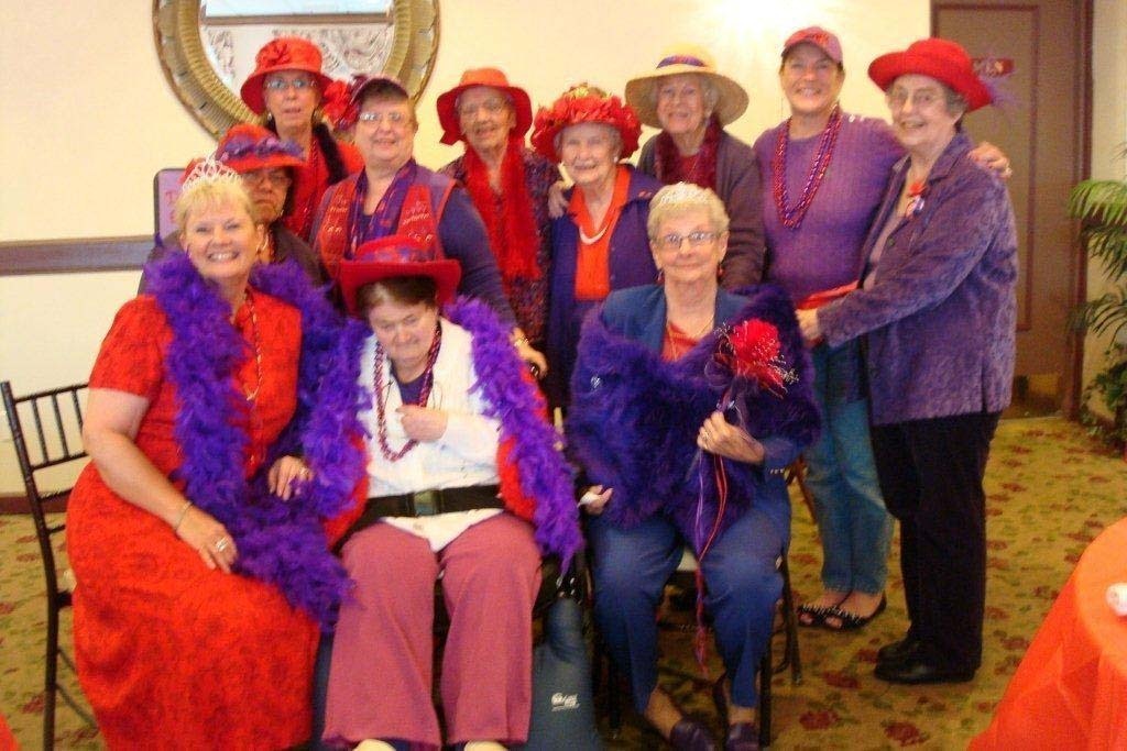 red hat purple dress club Red hats and purple dresses are the new in style