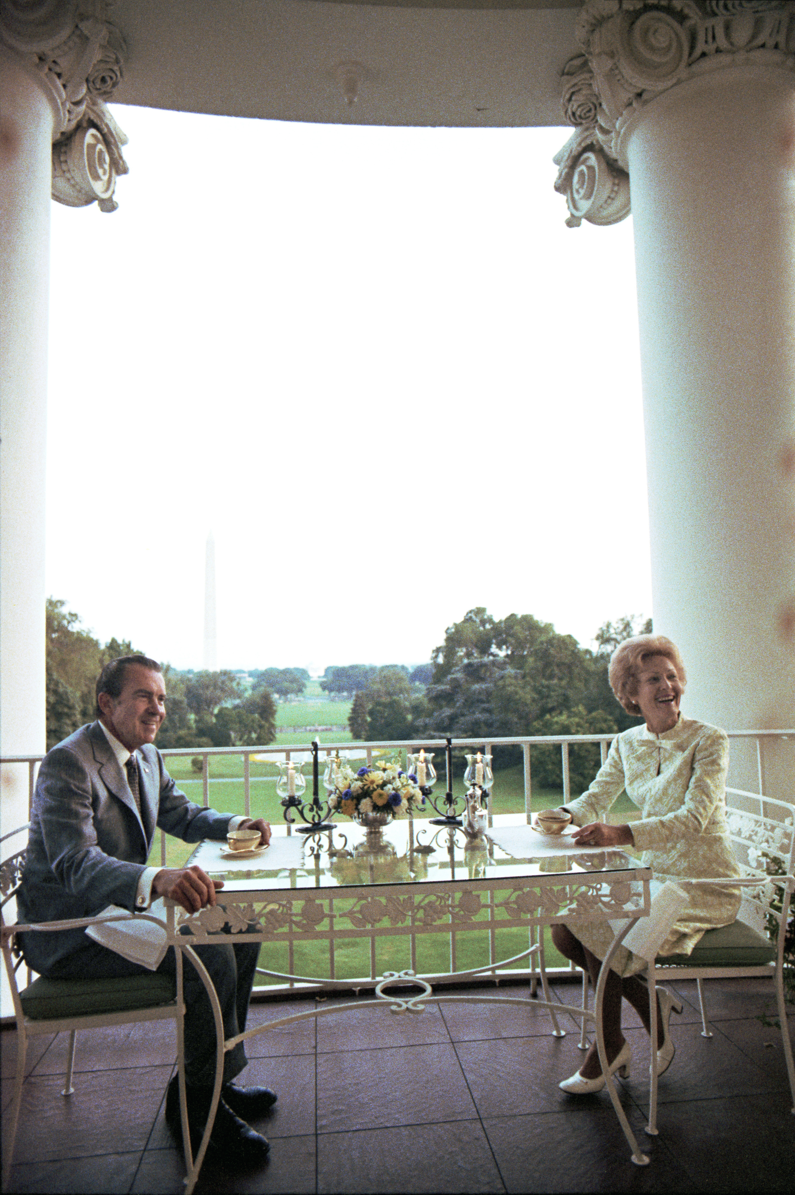 President Nixon and Pat Nixon having a cup of coffee on the Truman balcony. July 25, 1972.