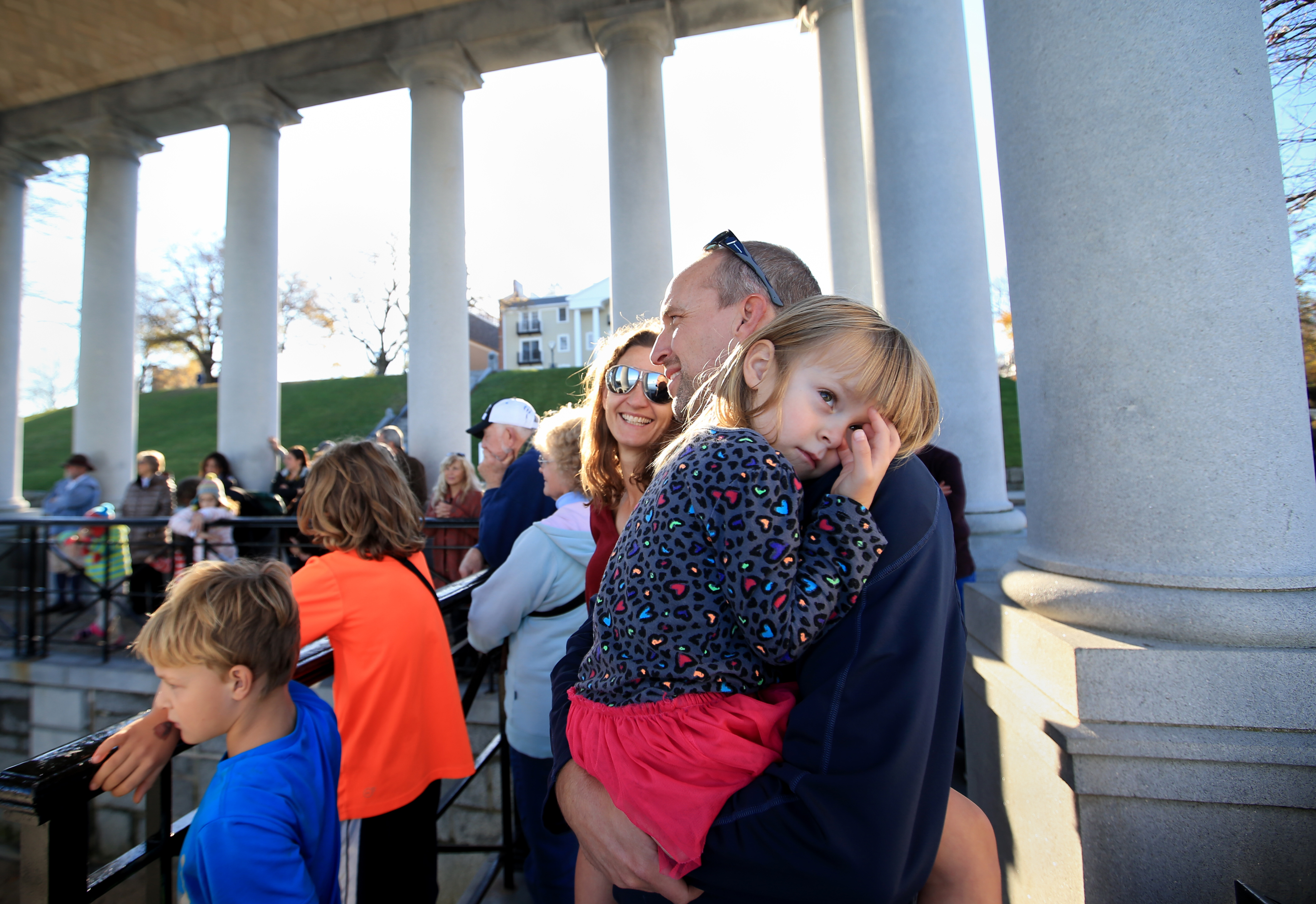Lily Welcker rested in the arms of her father, Chris, while visiting Plymouth Rock in Plymouth.