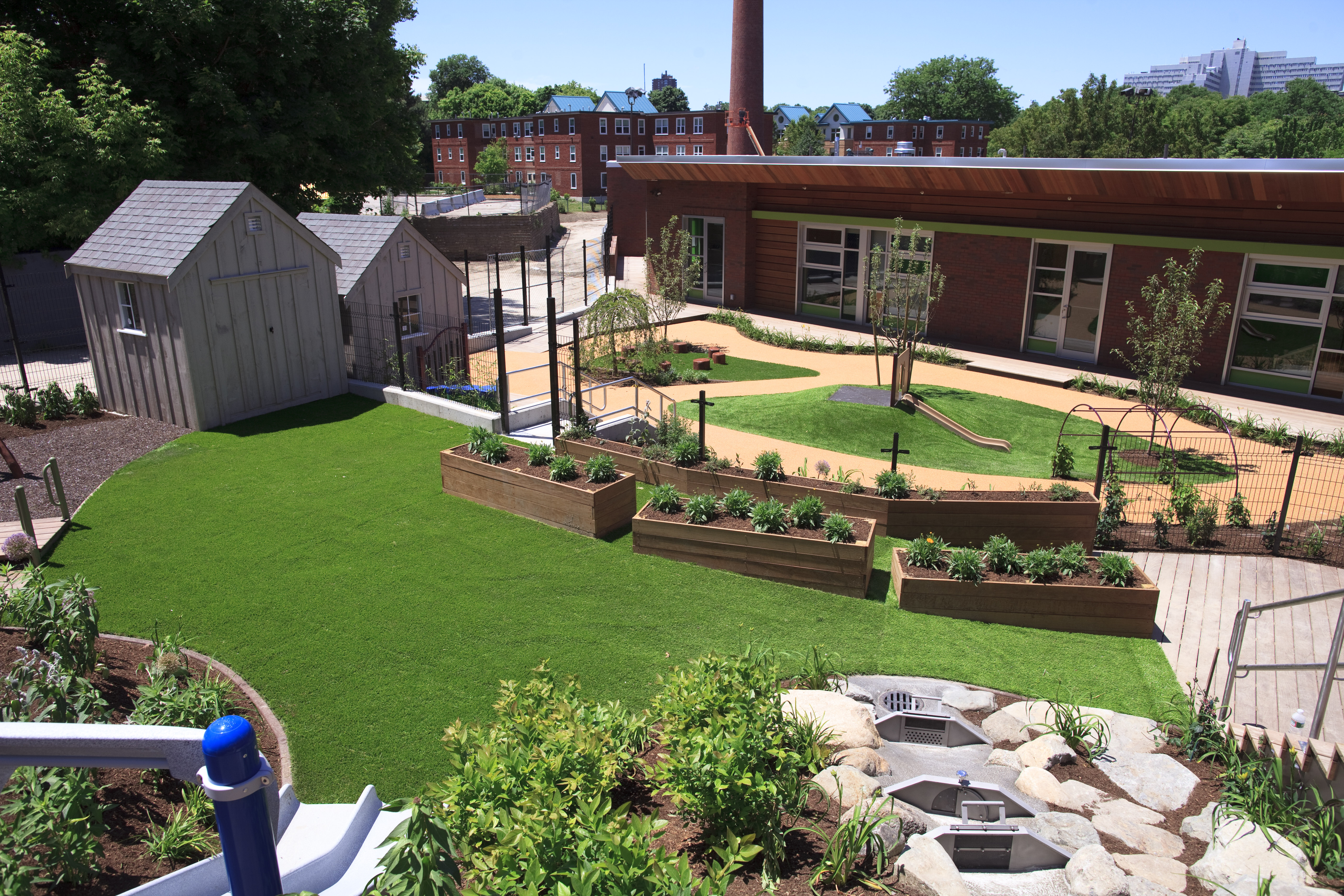 The facility includes 14,000 square feet of outdoor learning and play space.