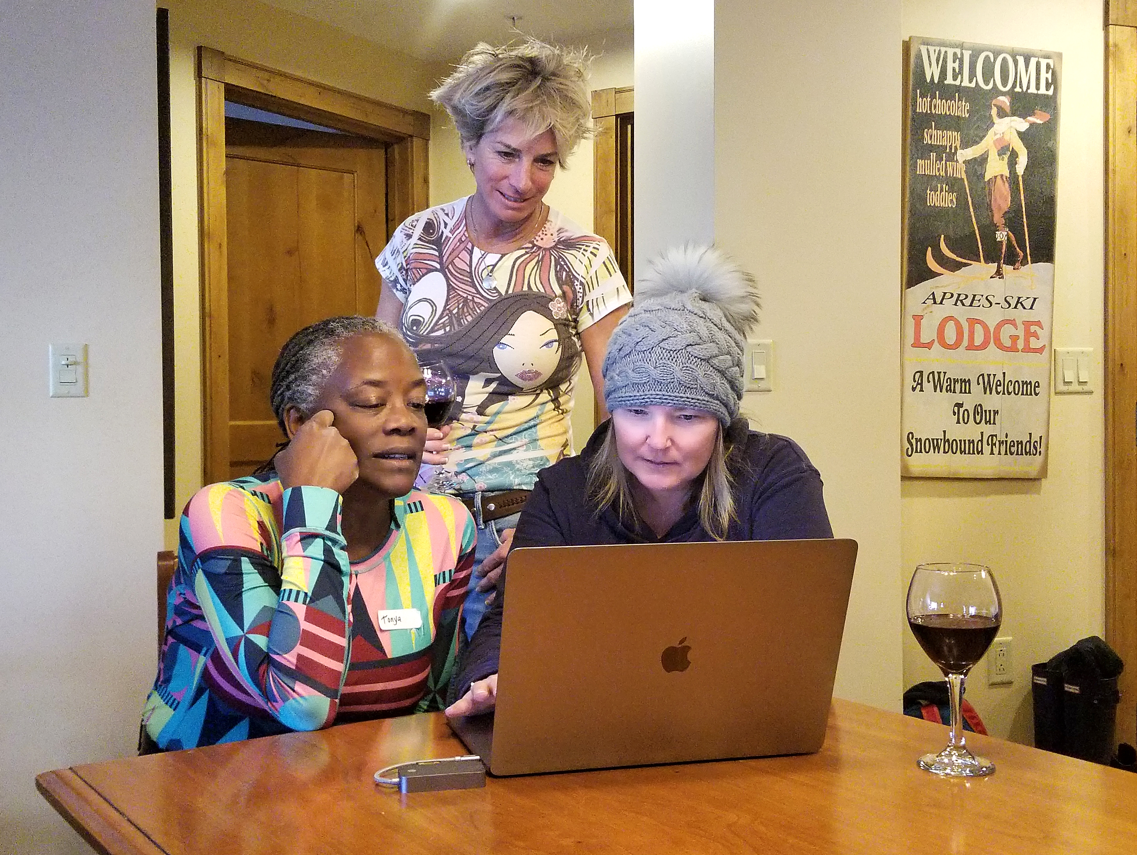 Kim Reichhelm (center, standing) and Emily Heikkinen, an instructor at Vail Resort, review a ski video with Tonya Drayden of Portland, Ore., during a Ski With Kim women's clinic at Crested Butte Mountain Resort in Colorado.