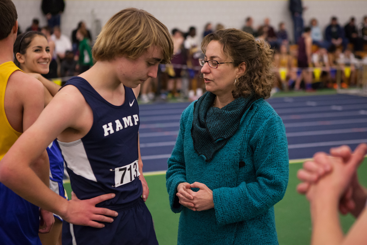 Karen Brown with son Sam during his track meet at Smith College in Northampton.