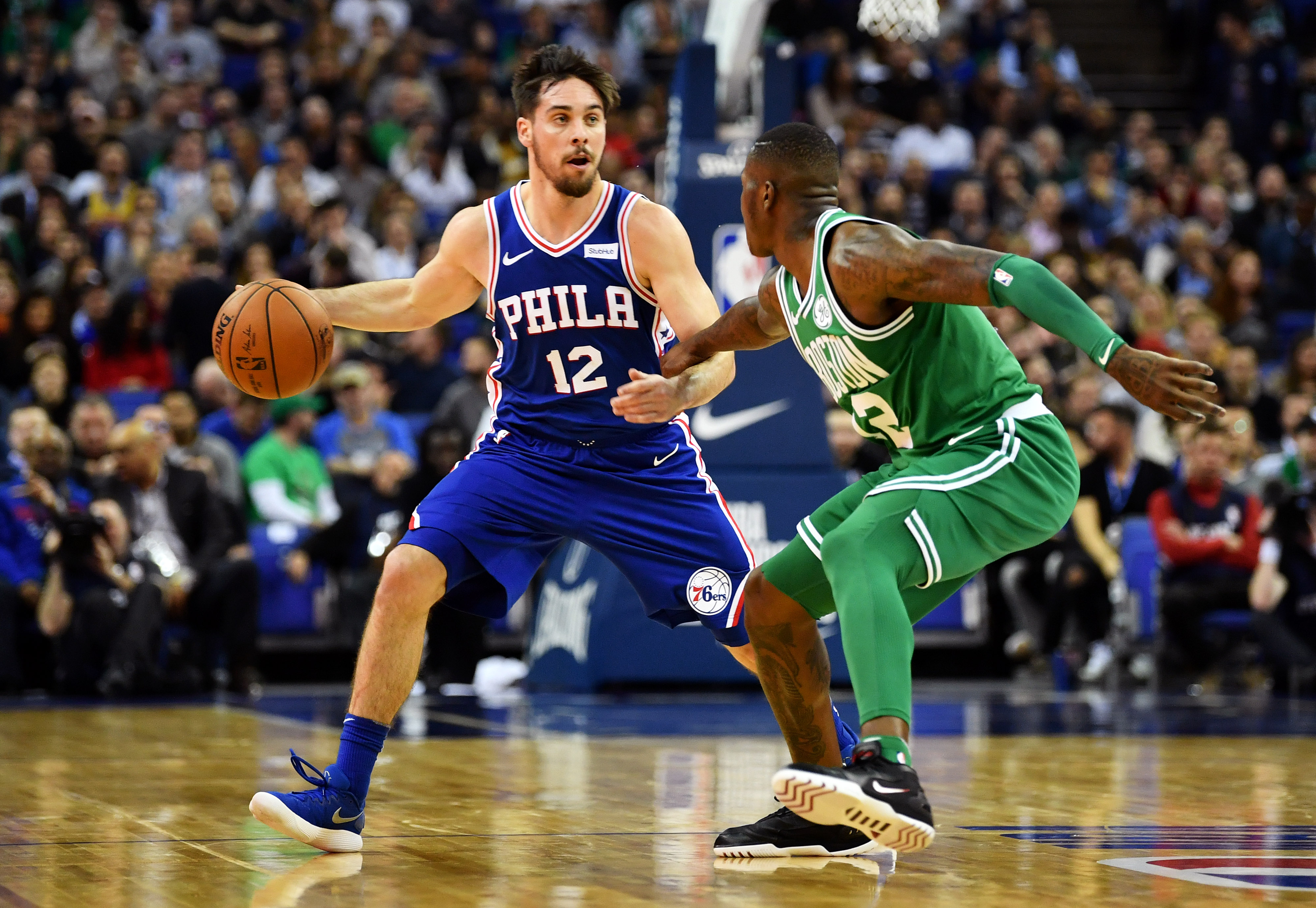 T.J. McConnell (12 points) takes on Terry Rozier (8 points).