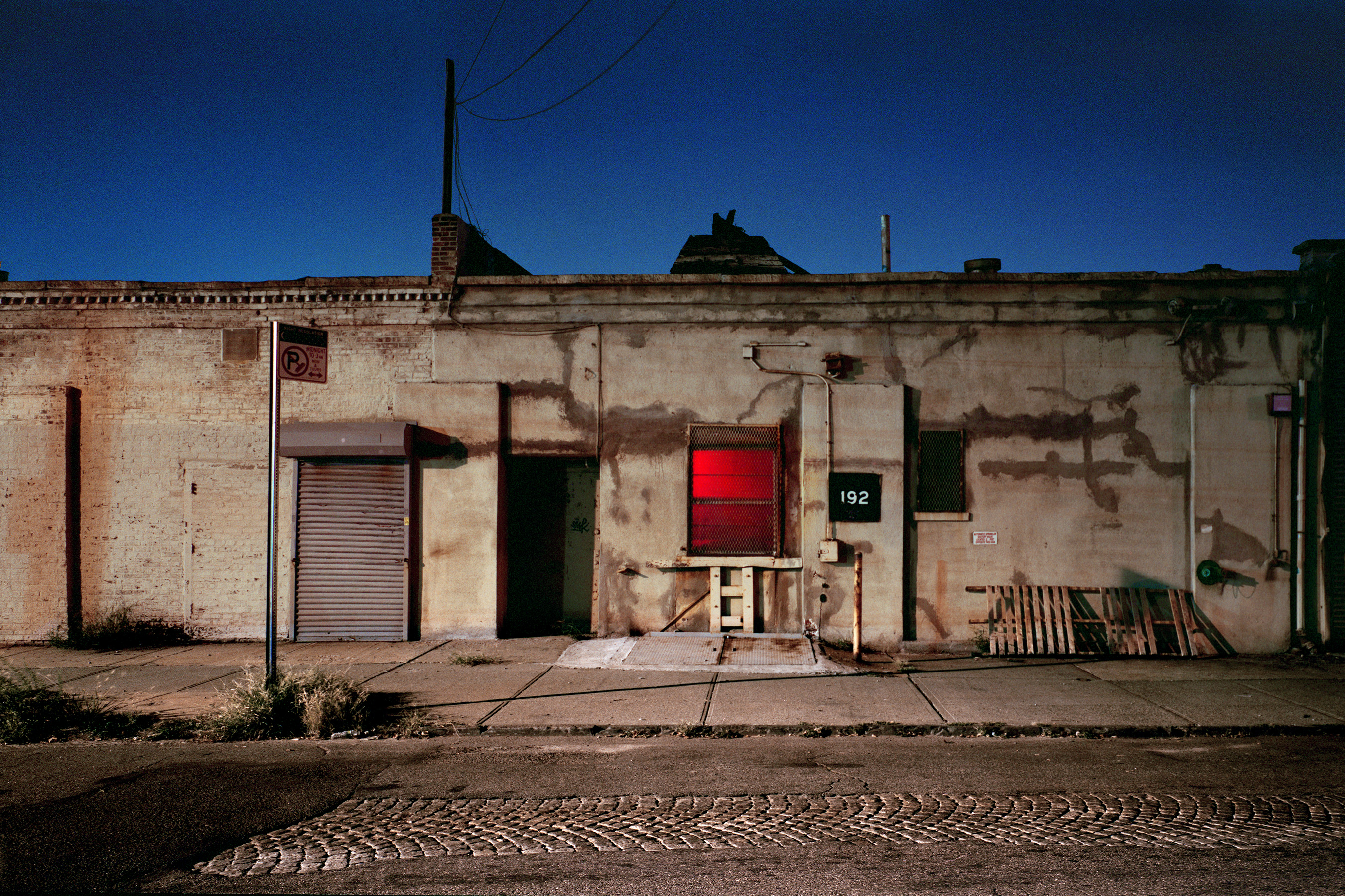 Lynn Saville’s “Dyckman St.” illustrates her focus on “the boundary times between night and day.”