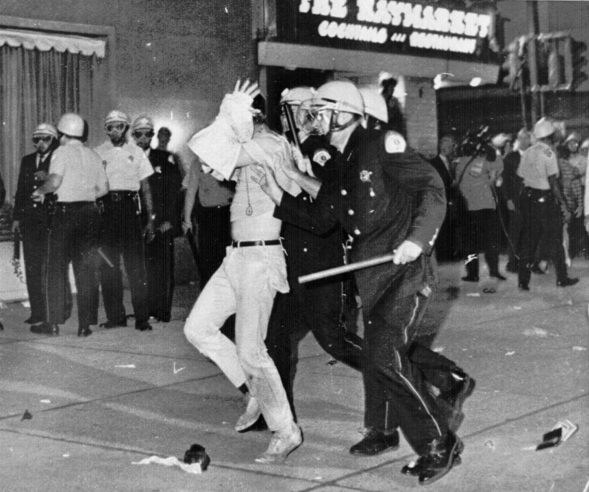 A Chicago police officer led a protester away.