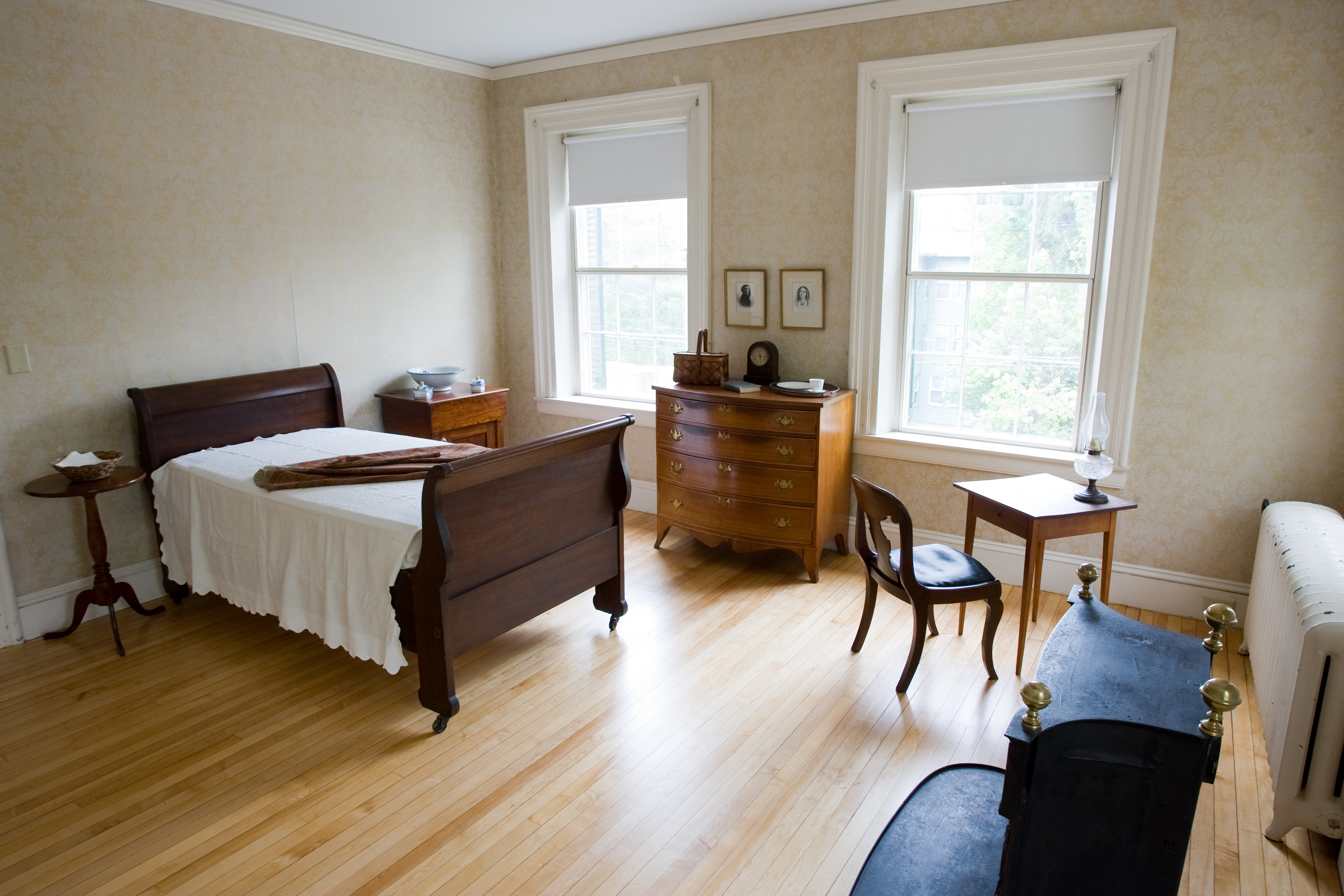 In Emily’s bedroom (upper left corner of the house) is the small table at which she wrote.