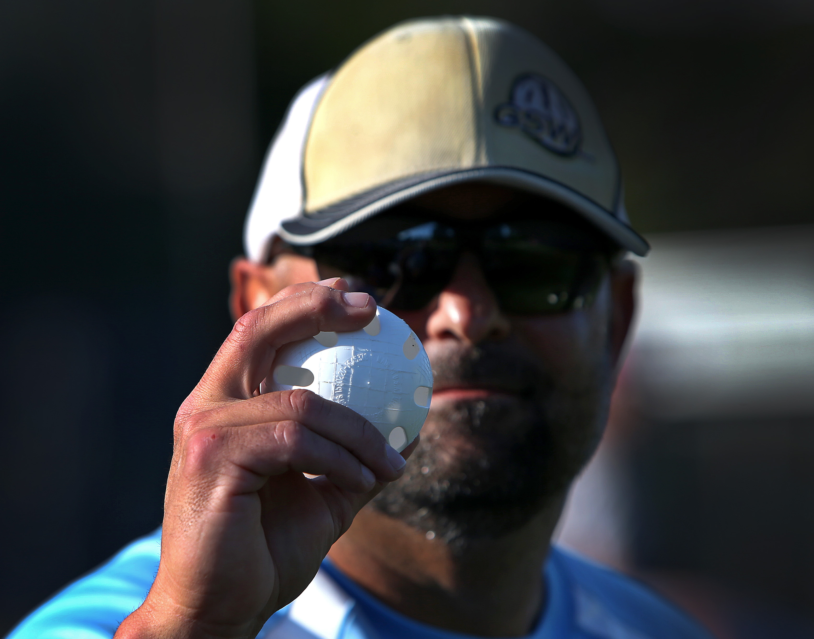 Player Dan Knab demonstrated his slider grip.