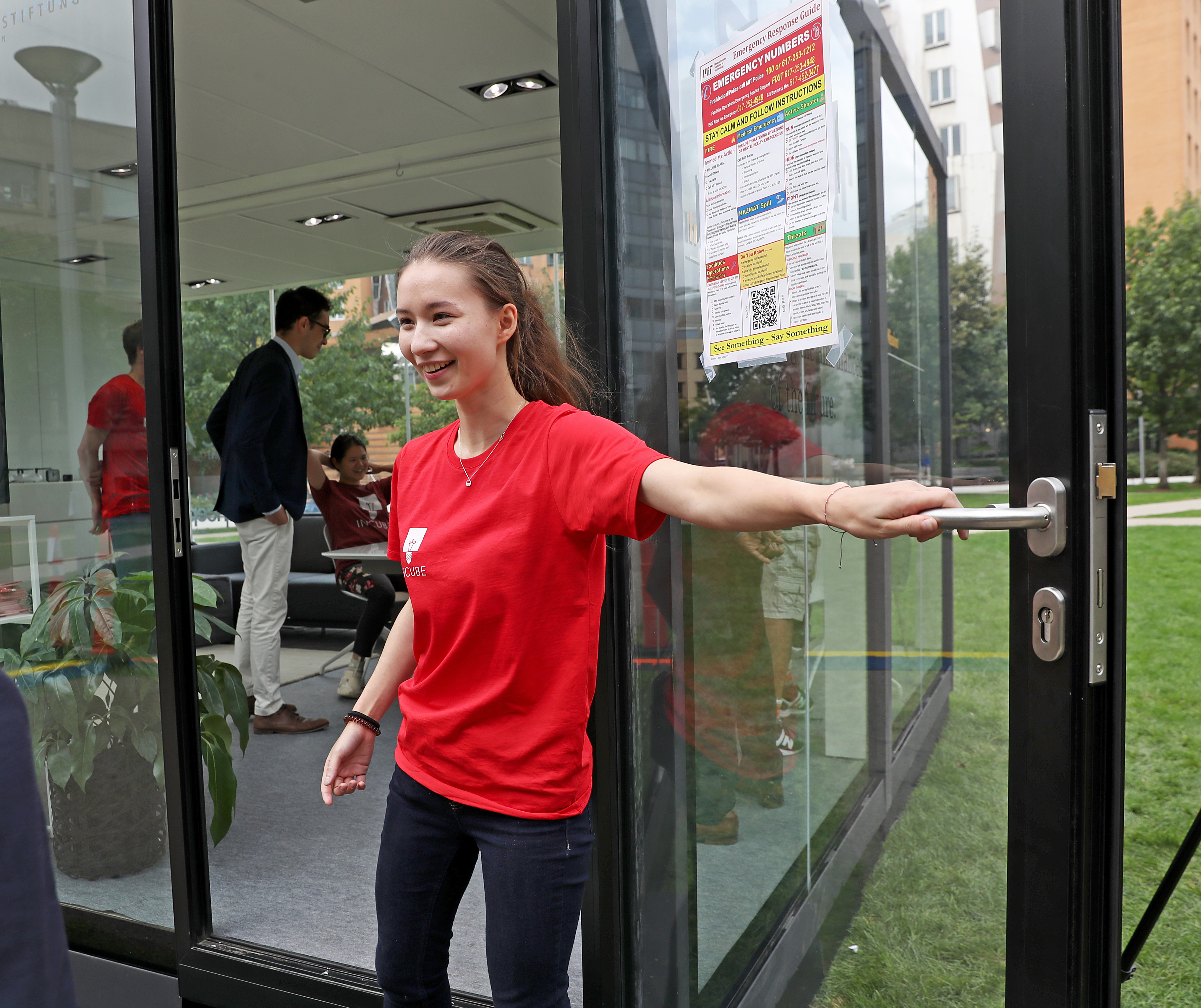 Signe Lin Kuei Vehusheia held the door of the cube.