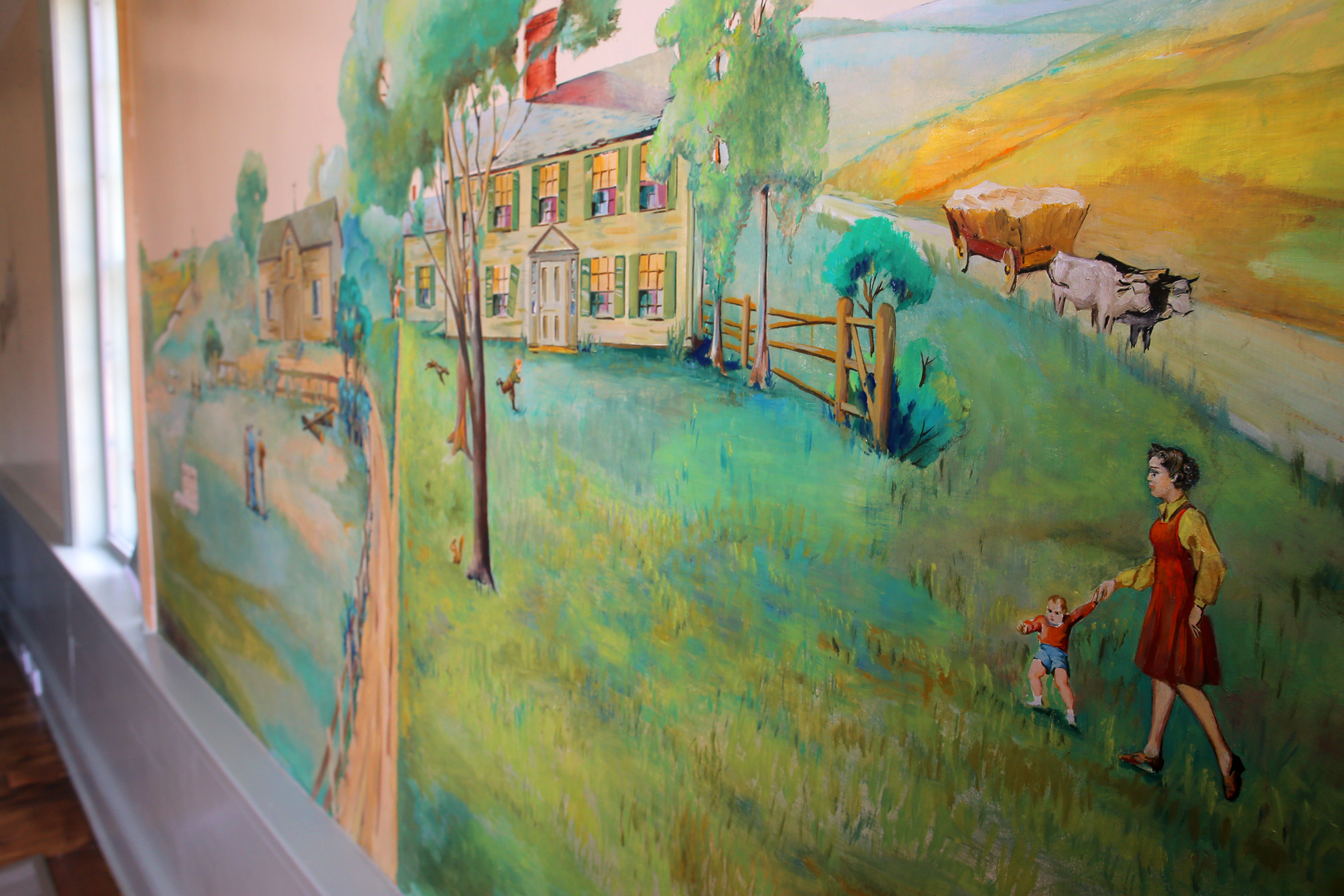 A mural on an interior wall of the farm house.
