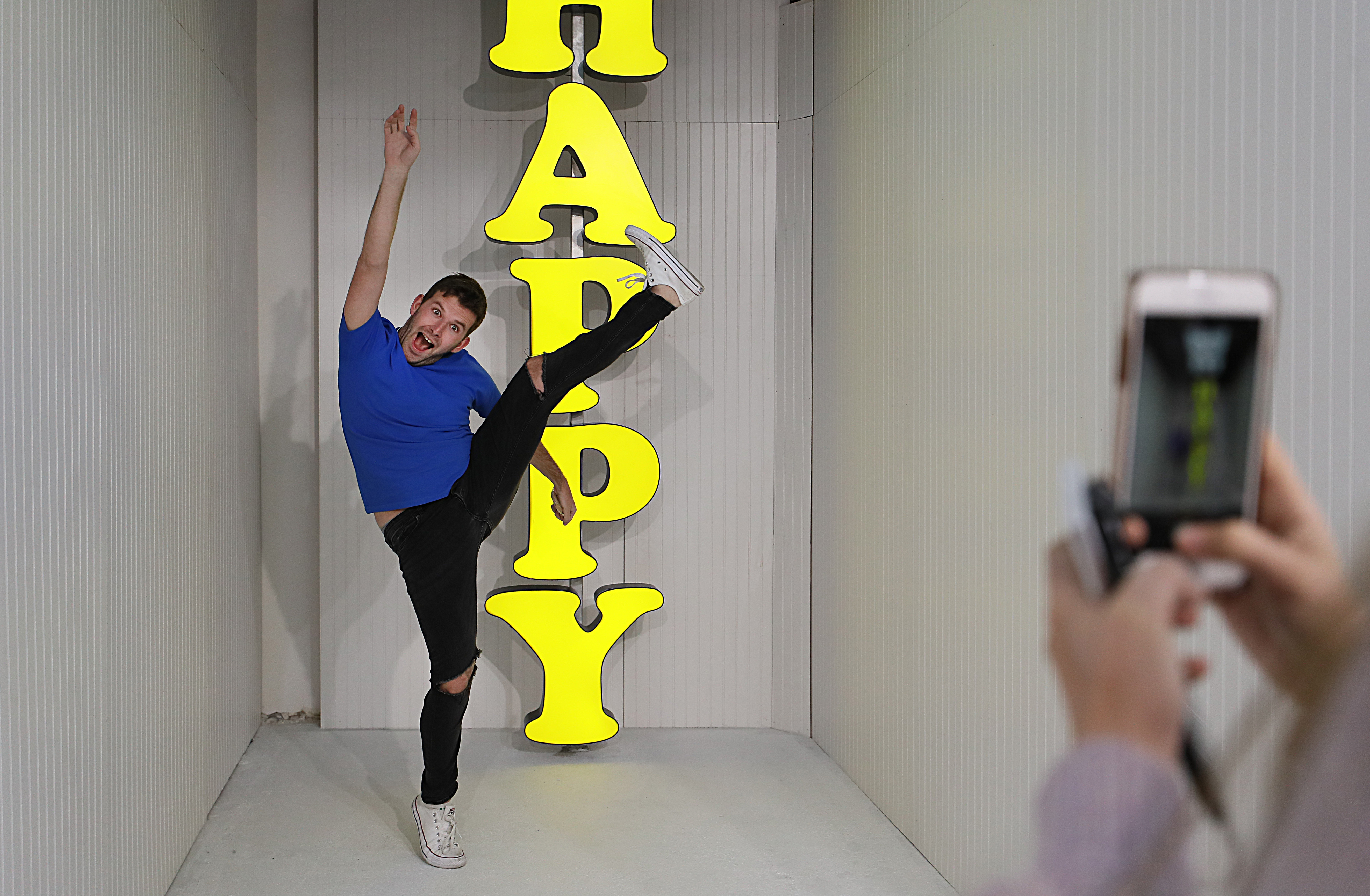 Hayden Cohen has his photo taken at “Happy Place.”