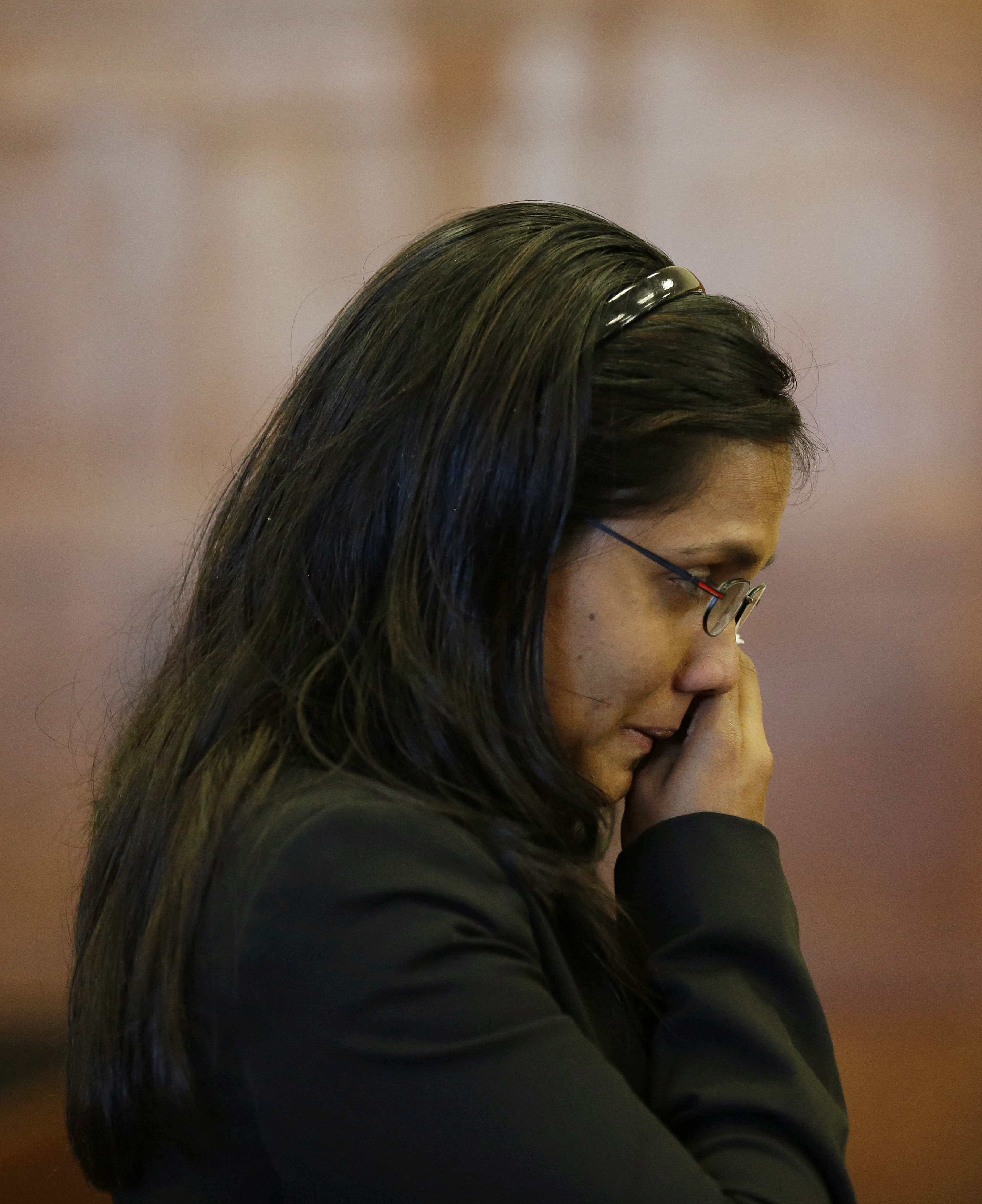 Annie Dookhan wiped tears from her face during a hearing at Suffolk Superior Court in Boston on Friday.