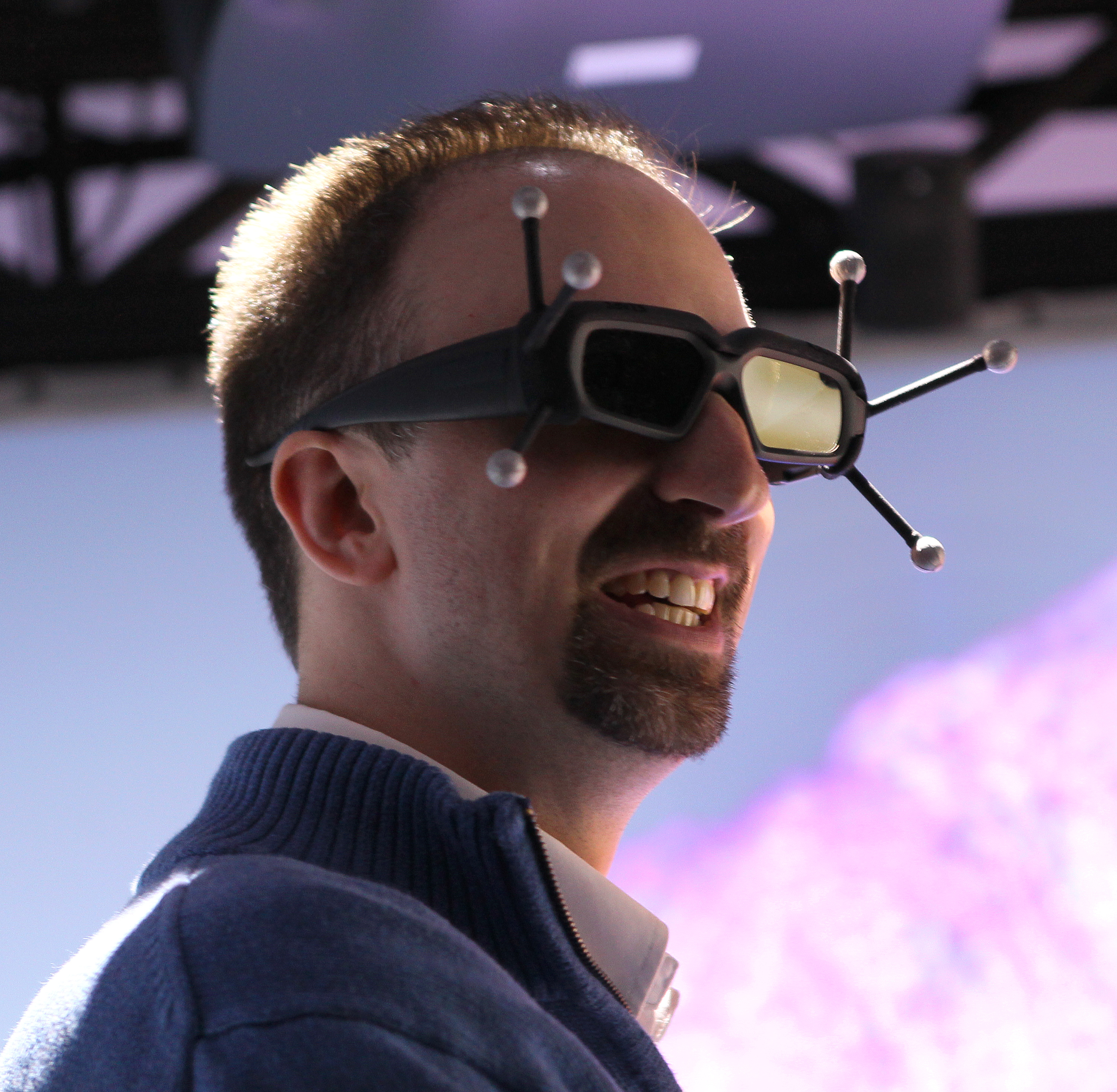 Pfizer chemist Kevin Hallock sported antenna-spiked 3-D glasses.