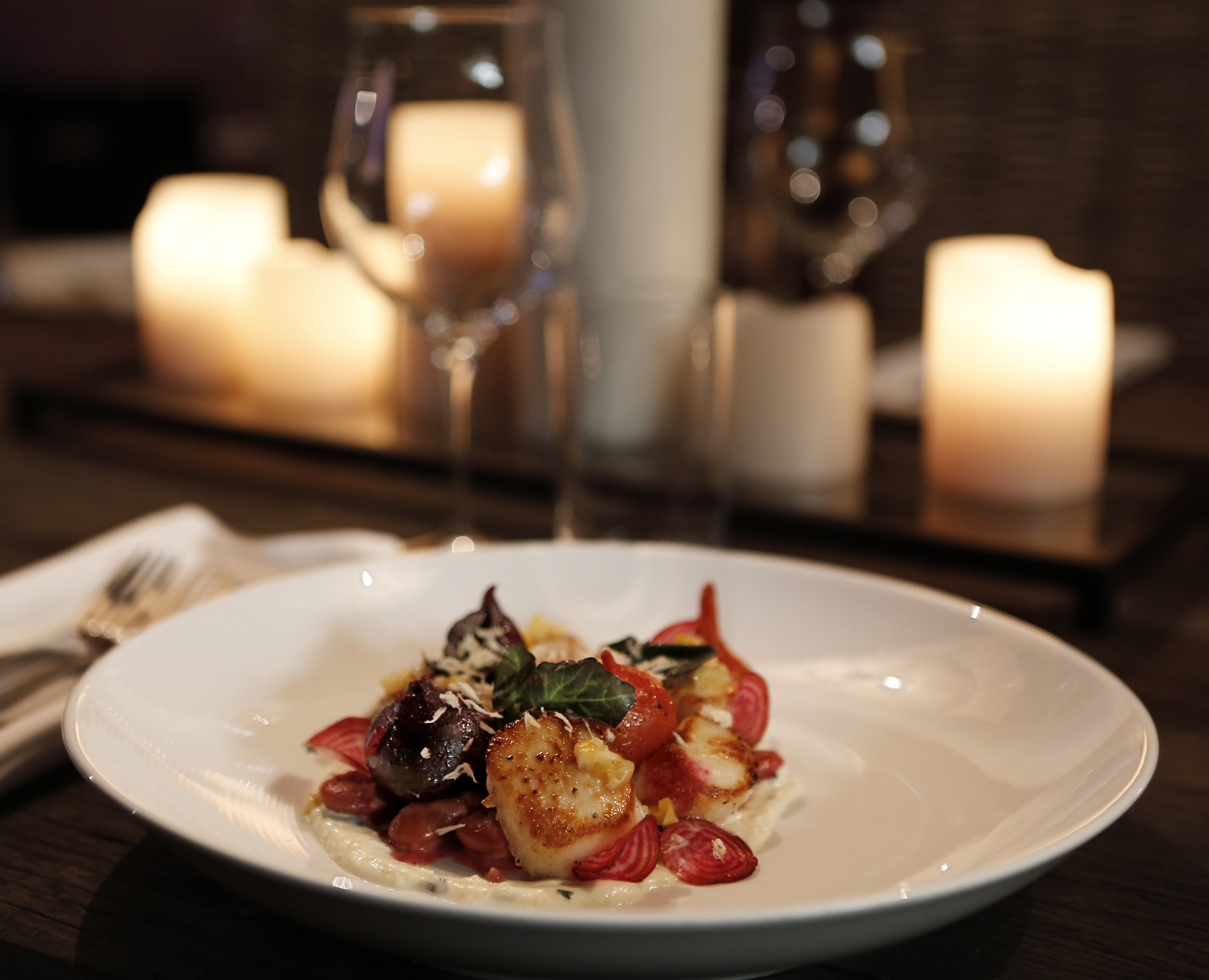Scallops-horseradish crema, gigante beans, roasted beets, and preserved meyer lemon.