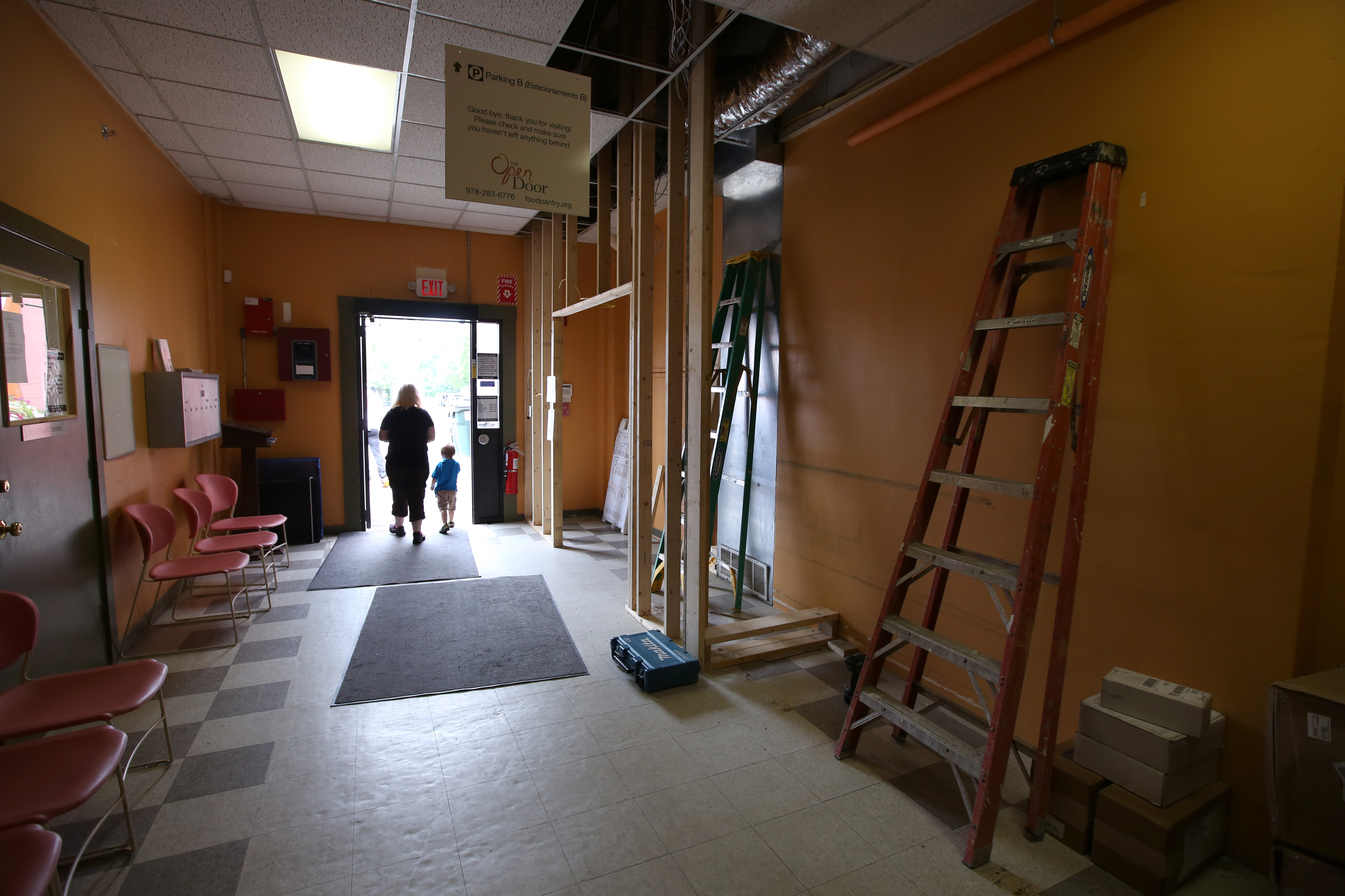 Expansion at the Open Door included a sprinkler room being framed near the main entrance.