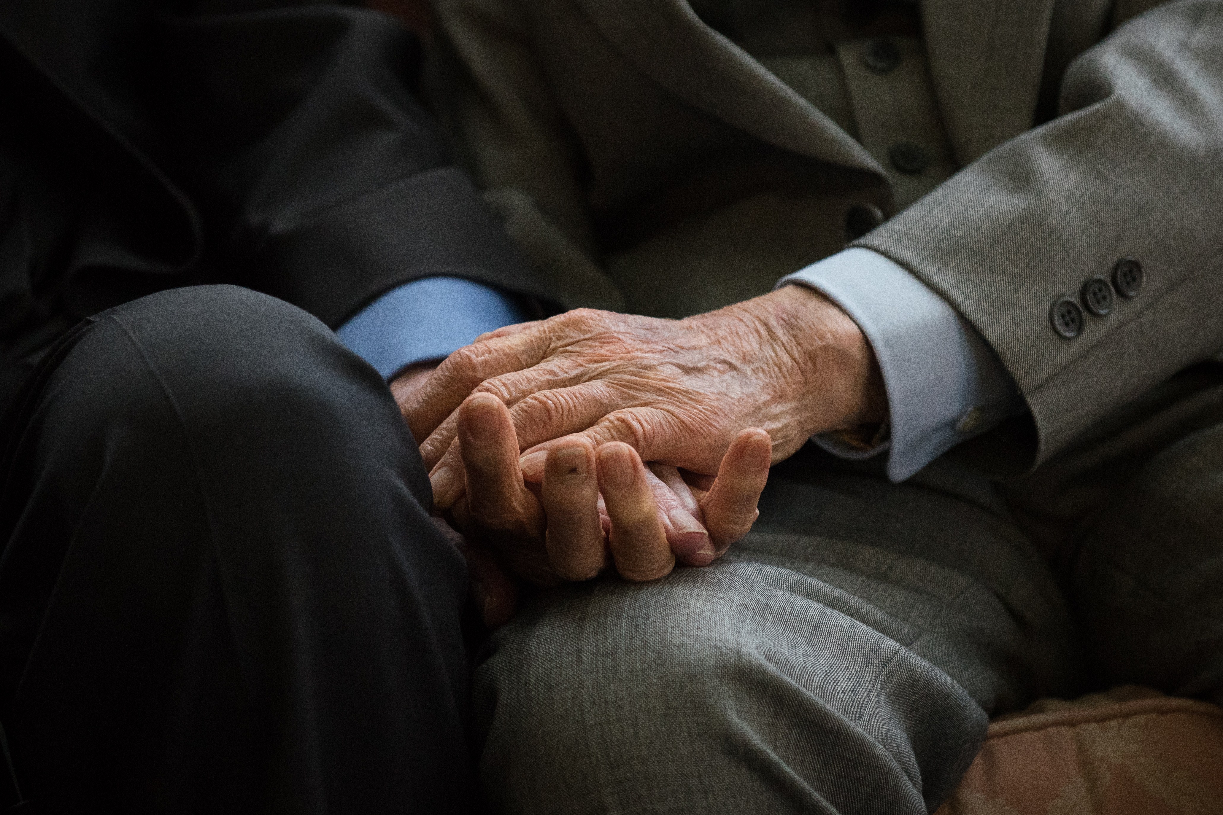 World War II veterans, British former army captain Harold Atcherley (left), 96, and Japanese former army engineer Mikio Kinoshita (right), 94, held hands as they attended a reception in their honor in London in June. While held as a prisoner of war by the Imperial Japanese Army in 1943, Atcherley was forced to work on the infamous Burma-Thailand “death railway,” a Japanese wartime project that cost the lives of an estimated 120,000 people. Kinoshita served as a Japanese army engineer, working on the same railway line.