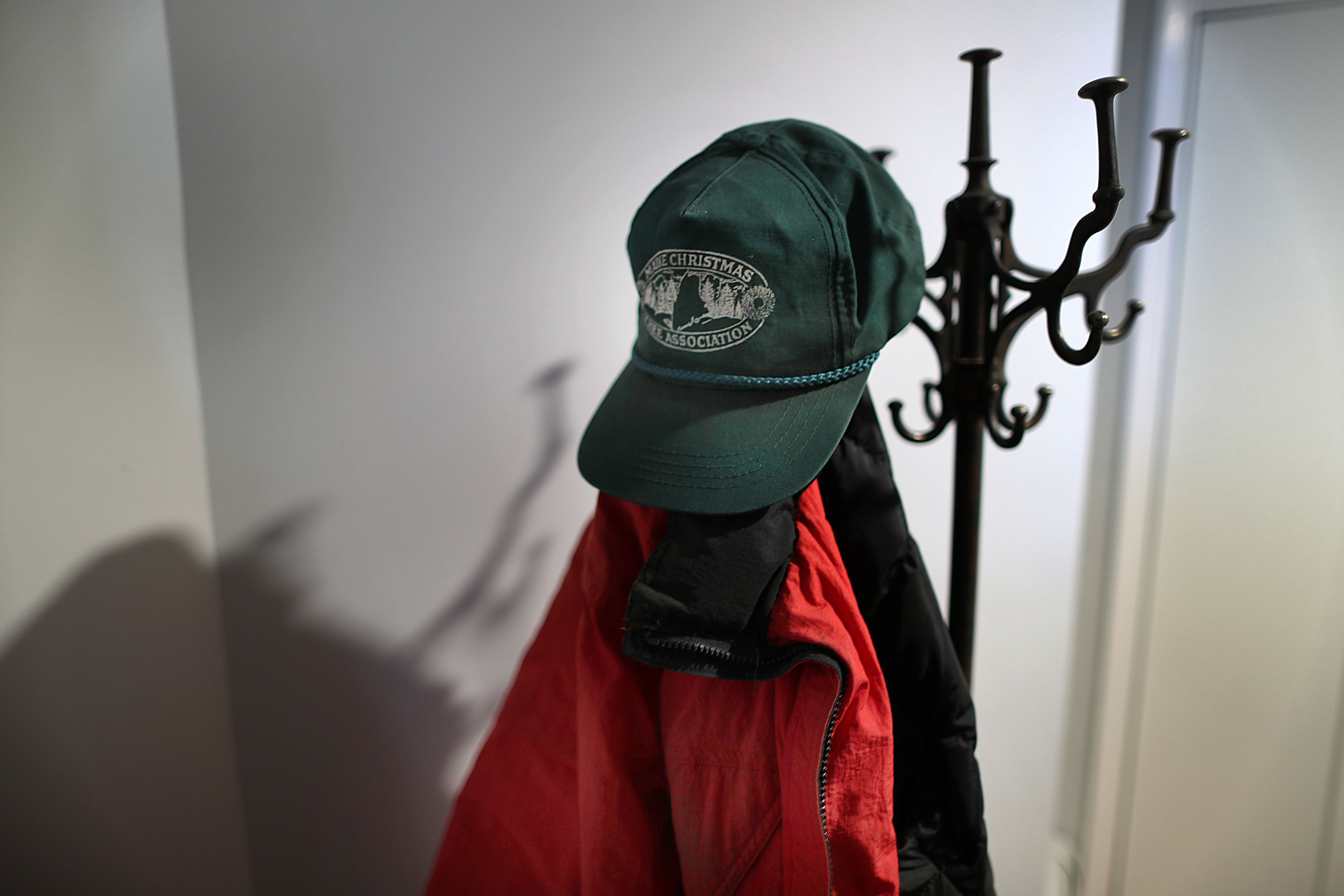 Jim Pearson, a Christmas tree farmer, was stabbed to death last month in the driveway of the farm where he lived with his wife, Nancy. Jim's favorite hat and coat are on a coat rack in the home.