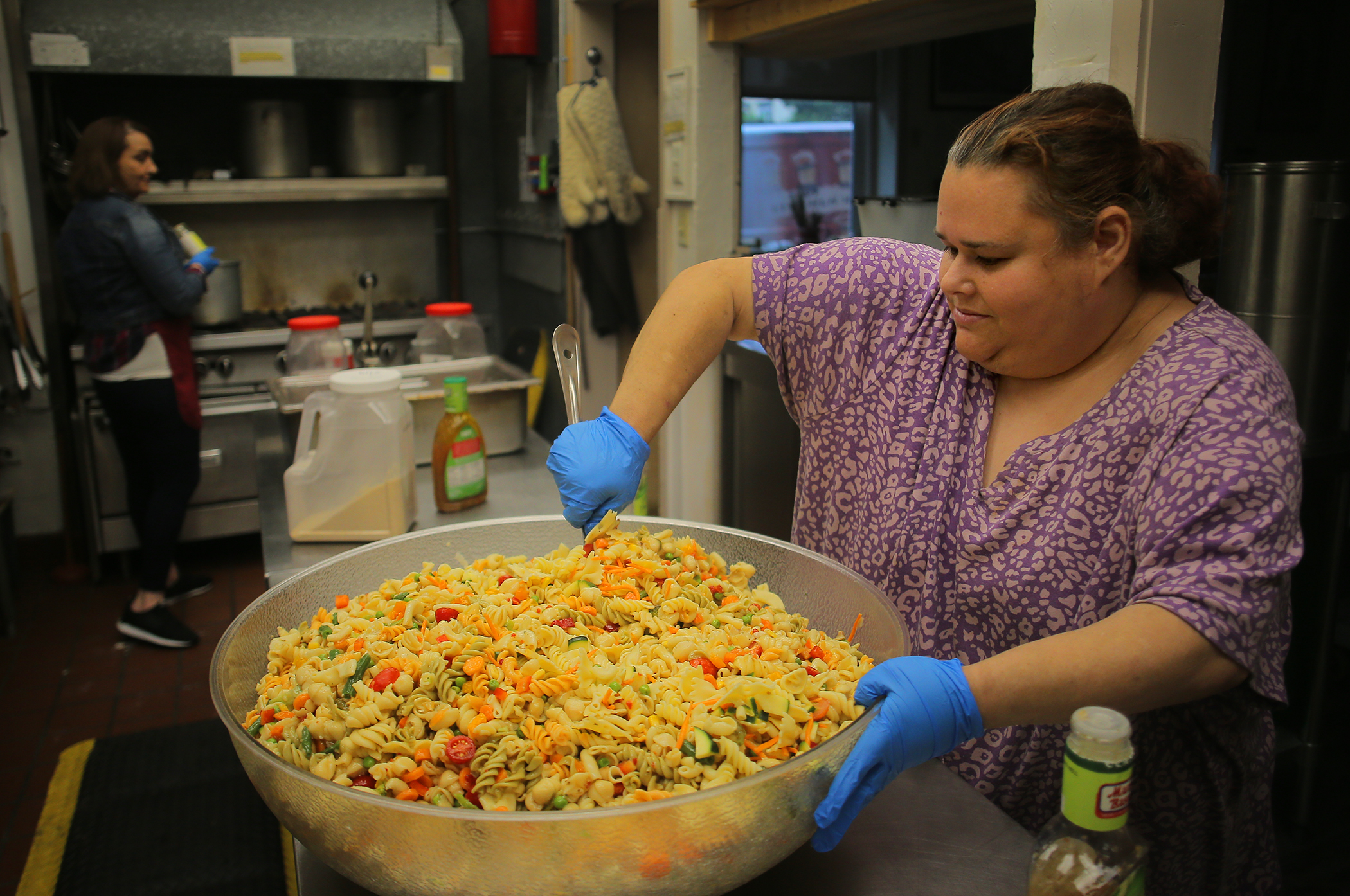April Vitulli made dinner at a Lawrence soup kitchen.