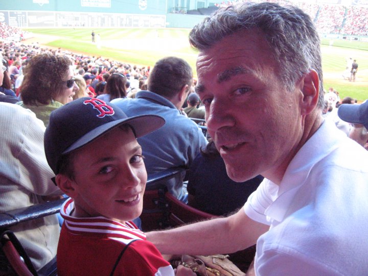 Father and son at Roman's first Red Sox game in April 2009.