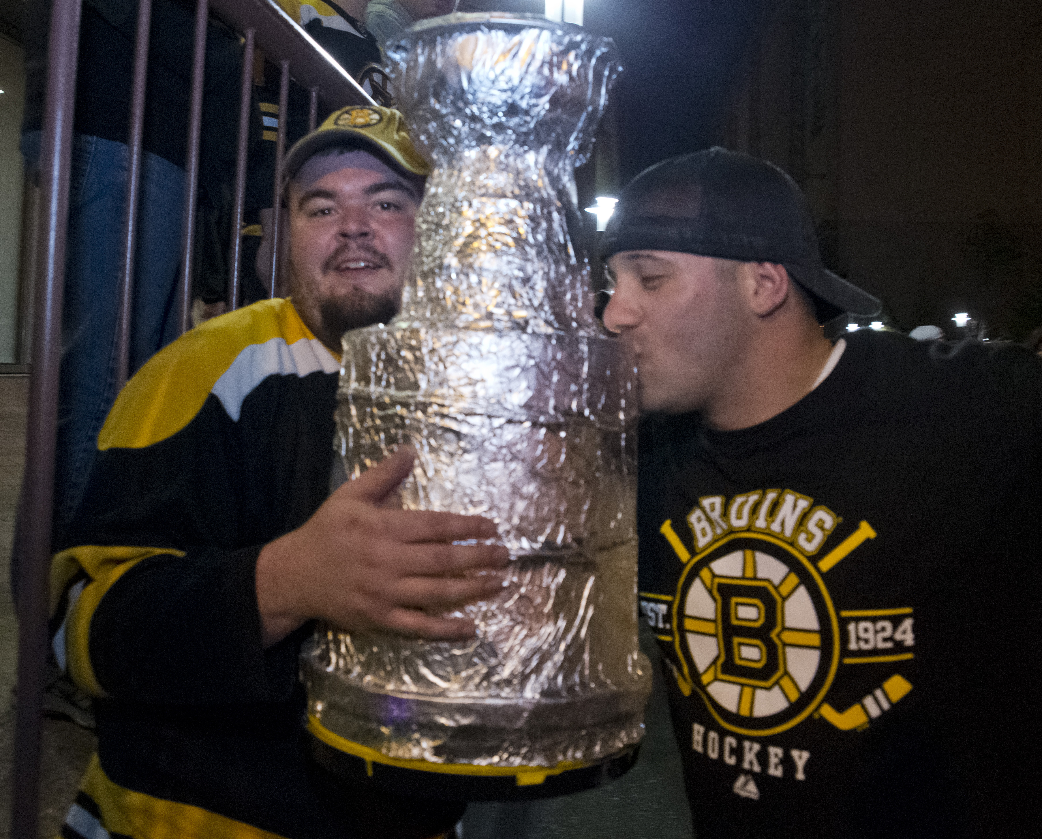 Brian Rogers, left and Jack Cardinal celebrated Monday after the Bruins’ Game 7 win.