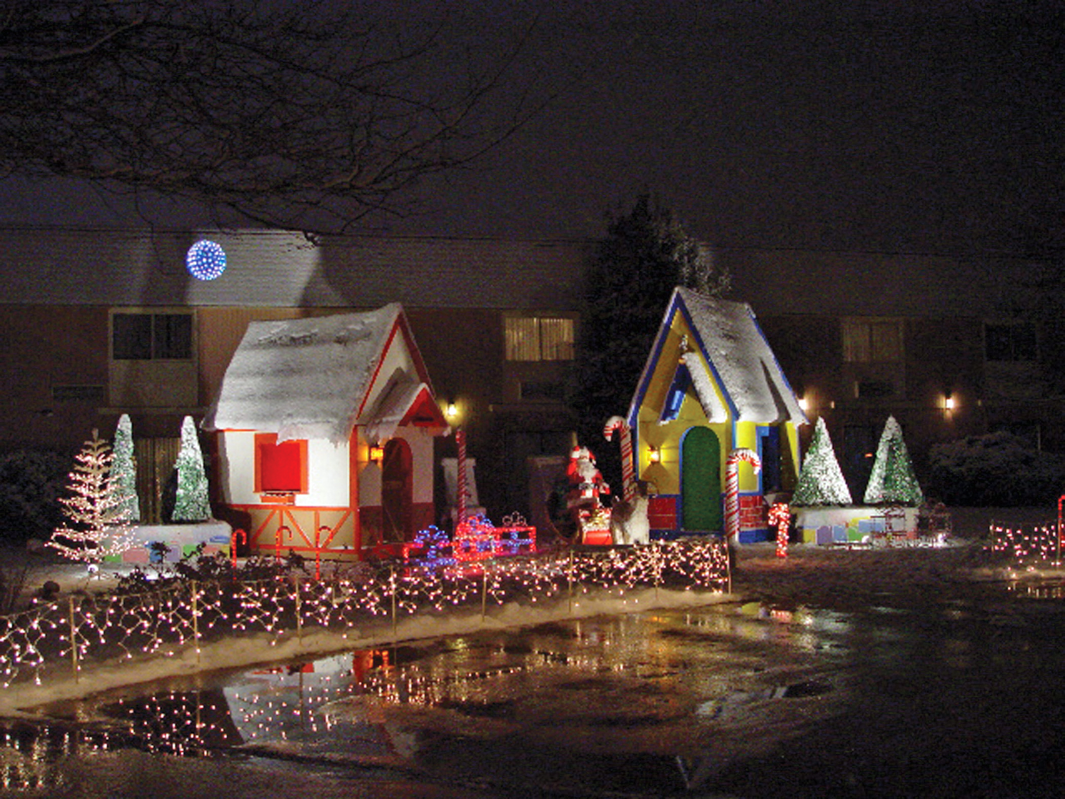 The Cape Codder Resort celebrates the holiday season with an Enchanted Village, illuminated with more than 100,000 lights.