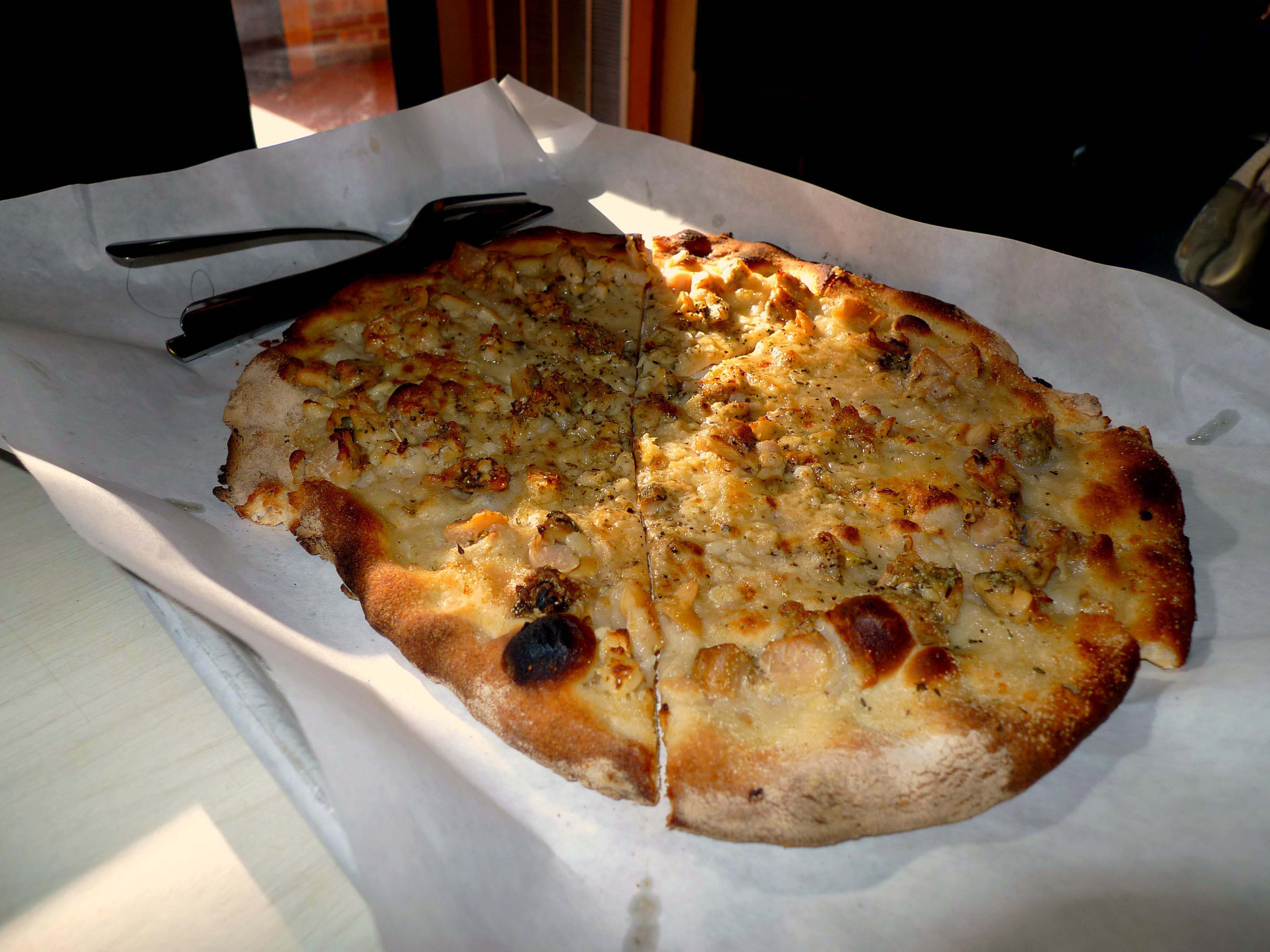 Frank Pepe Pizzeria Napoletana is famous for the white clam pizza.