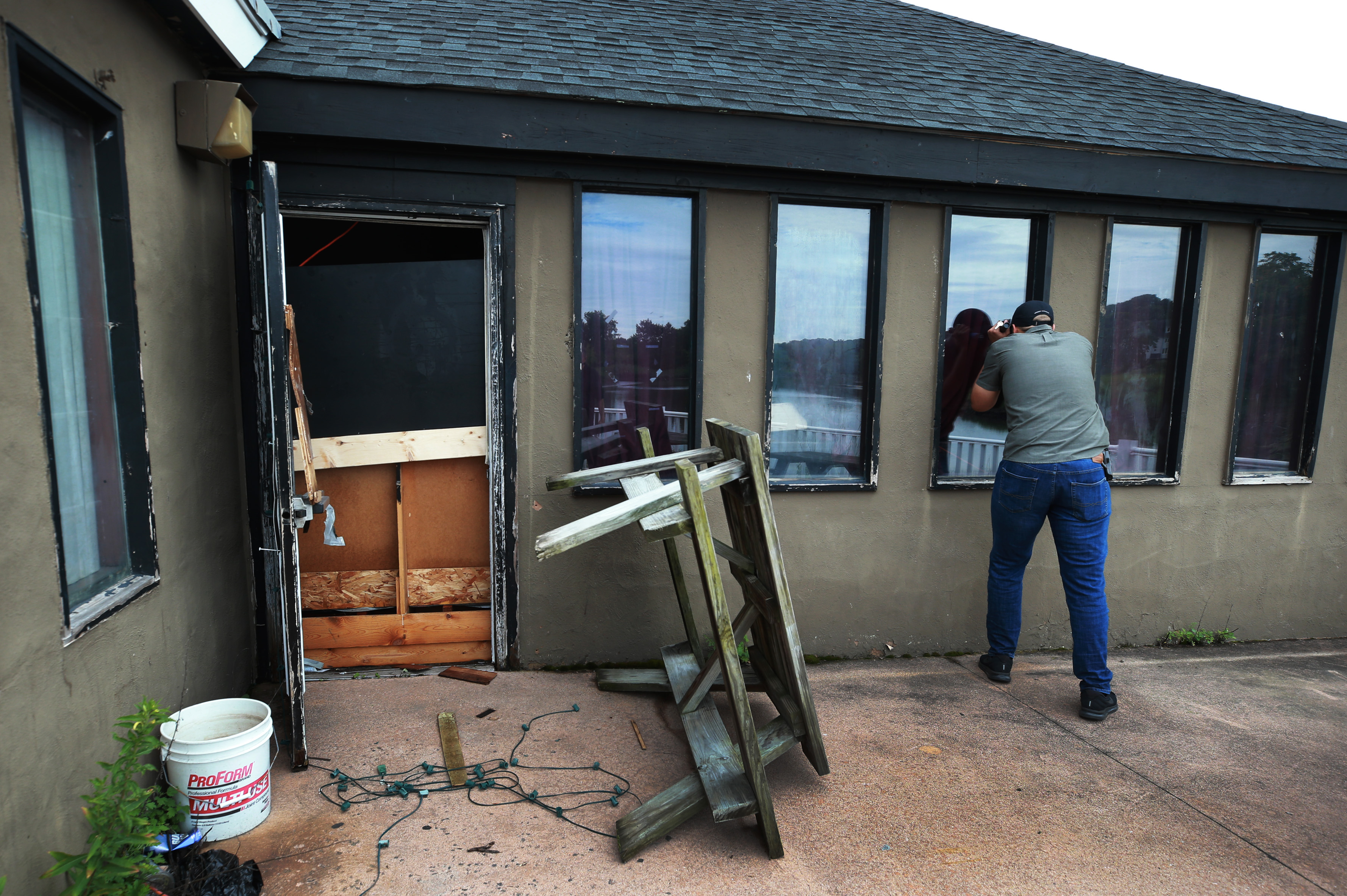 Jordan Avery peered through a window in the back of the building.
