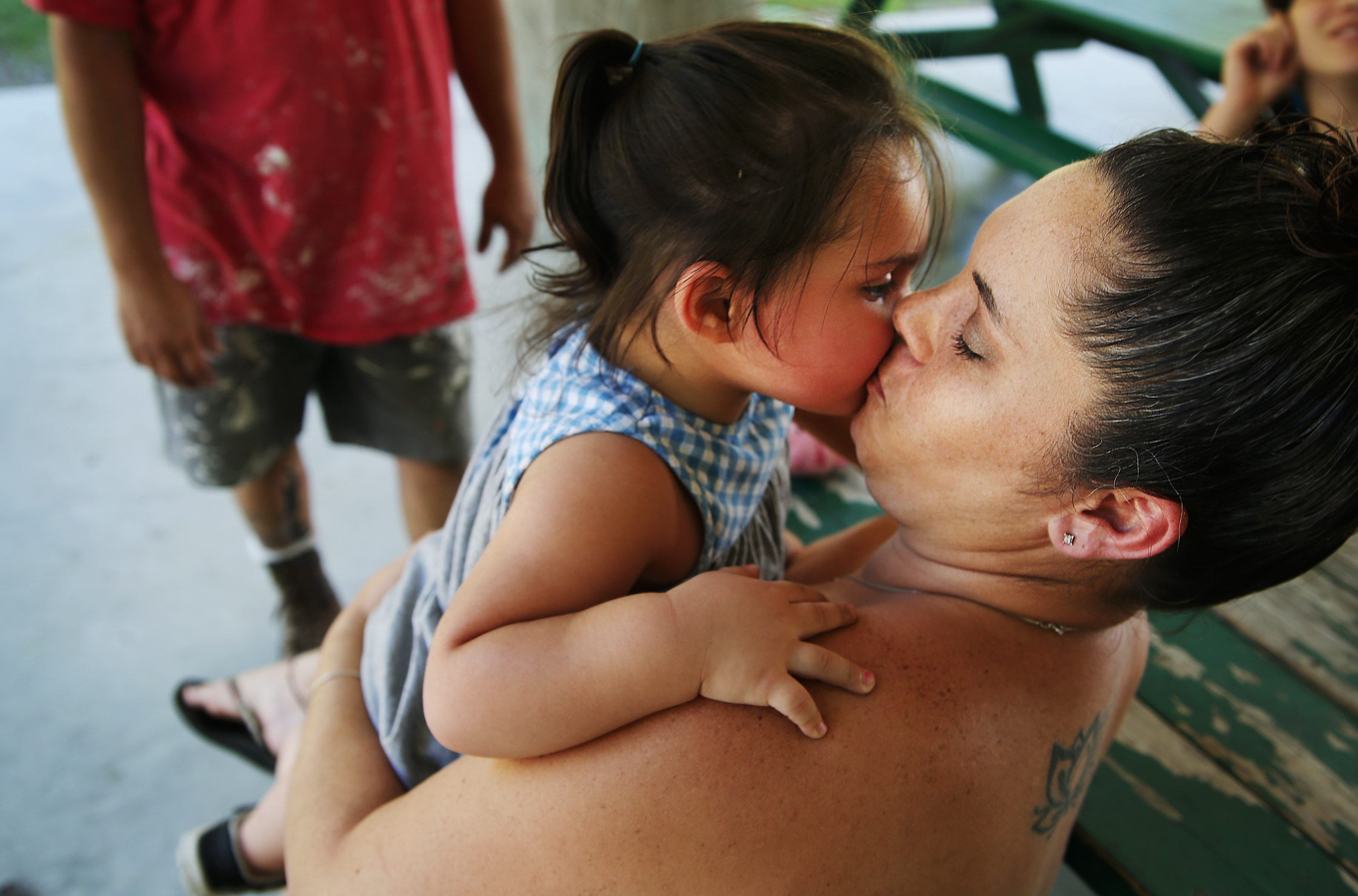 Ashley Raymond, with her daughter Mila, said getting treatment while she was pregnant changed her life. “I was so close to losing my kids,” she said.