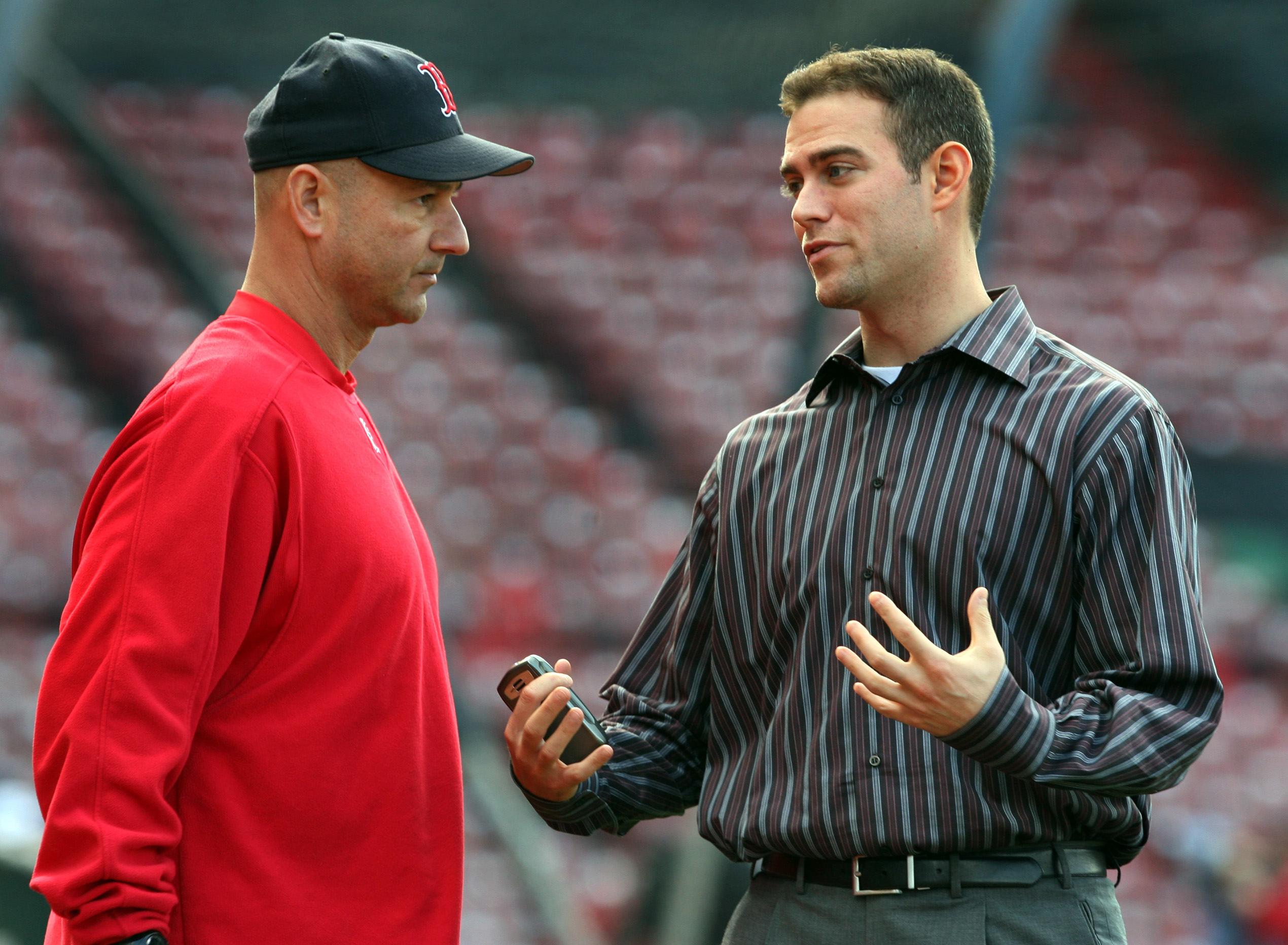 Theo Epstein talks with Terry Francona early in the season in 2006.