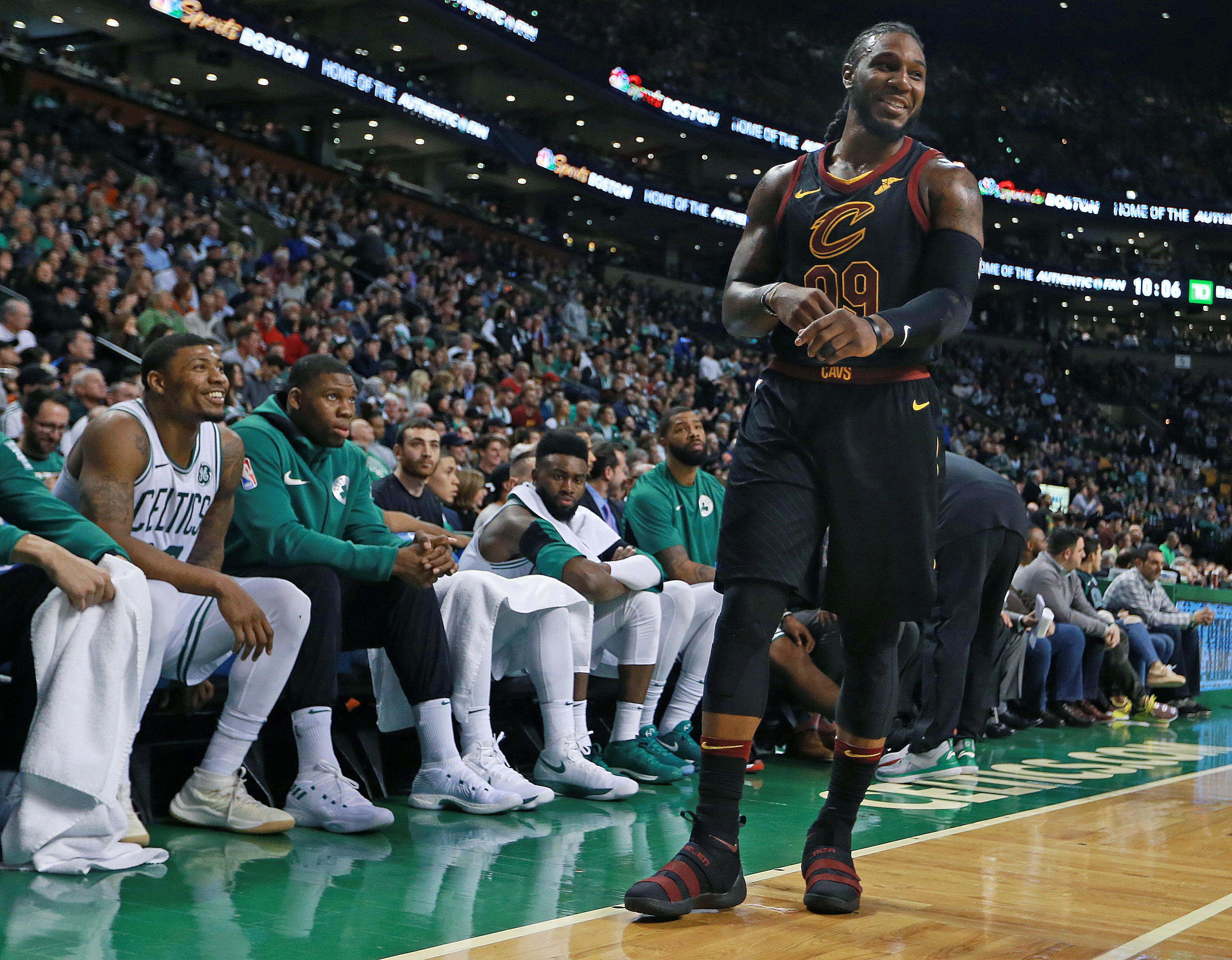 Cavaliers forward Jae Crowder (right) had to smile at something Marcus Smart (left) said in the fourth quarter.