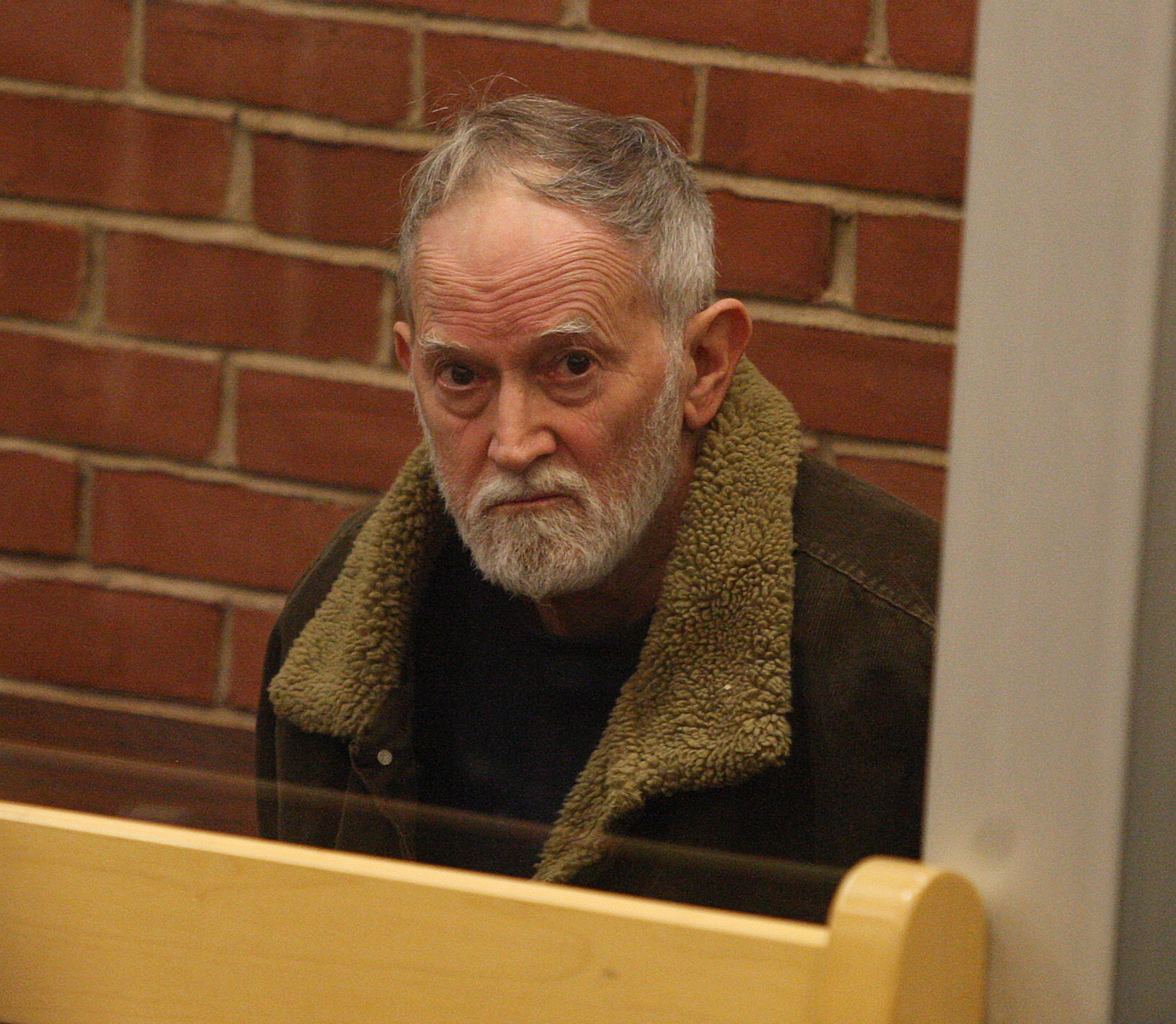 John B. Wittey, 70, was arraigned Friday in the murder of John E. Williams, also 70, in his home on Monday night.