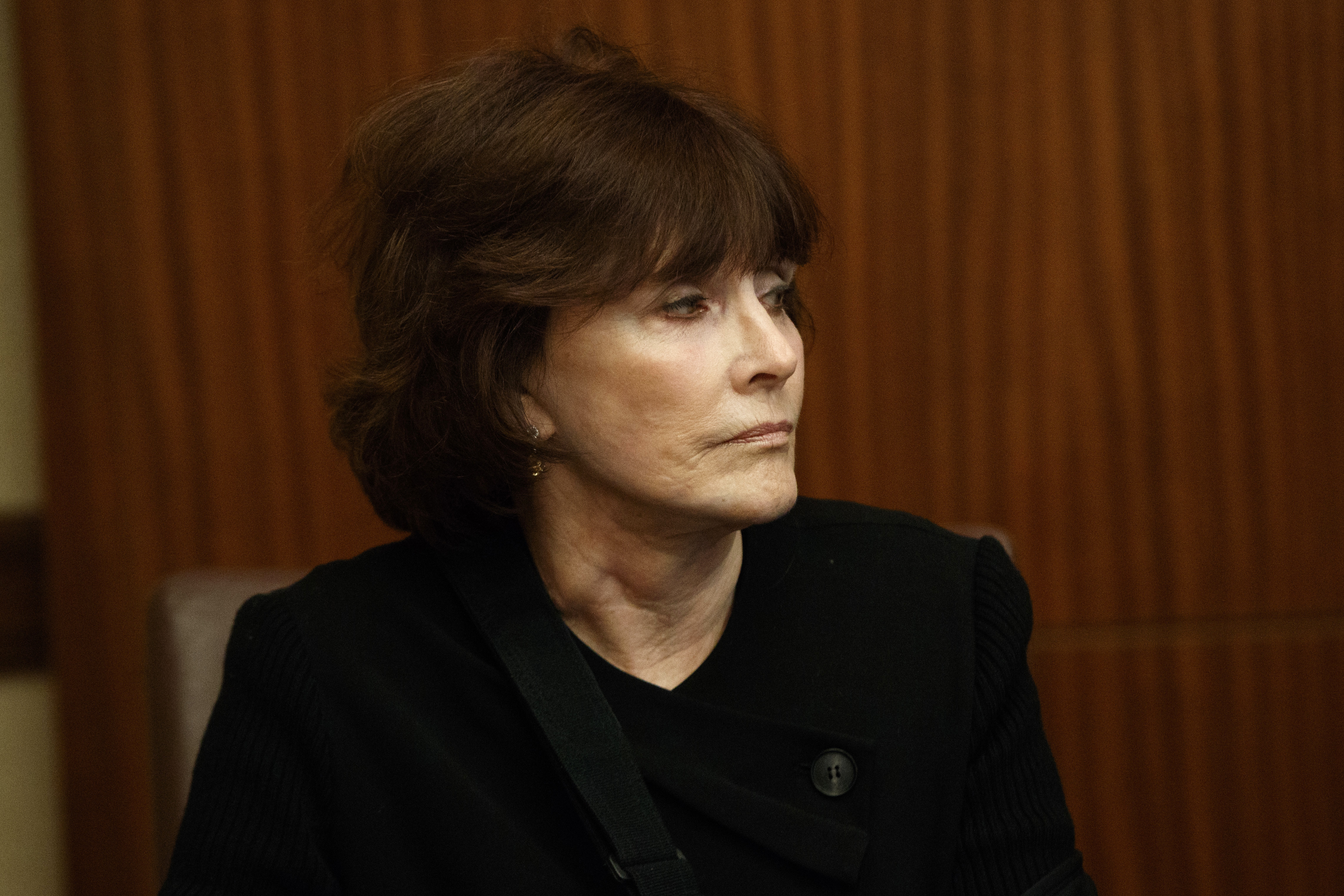 Kathleen Willey looked on during the event.