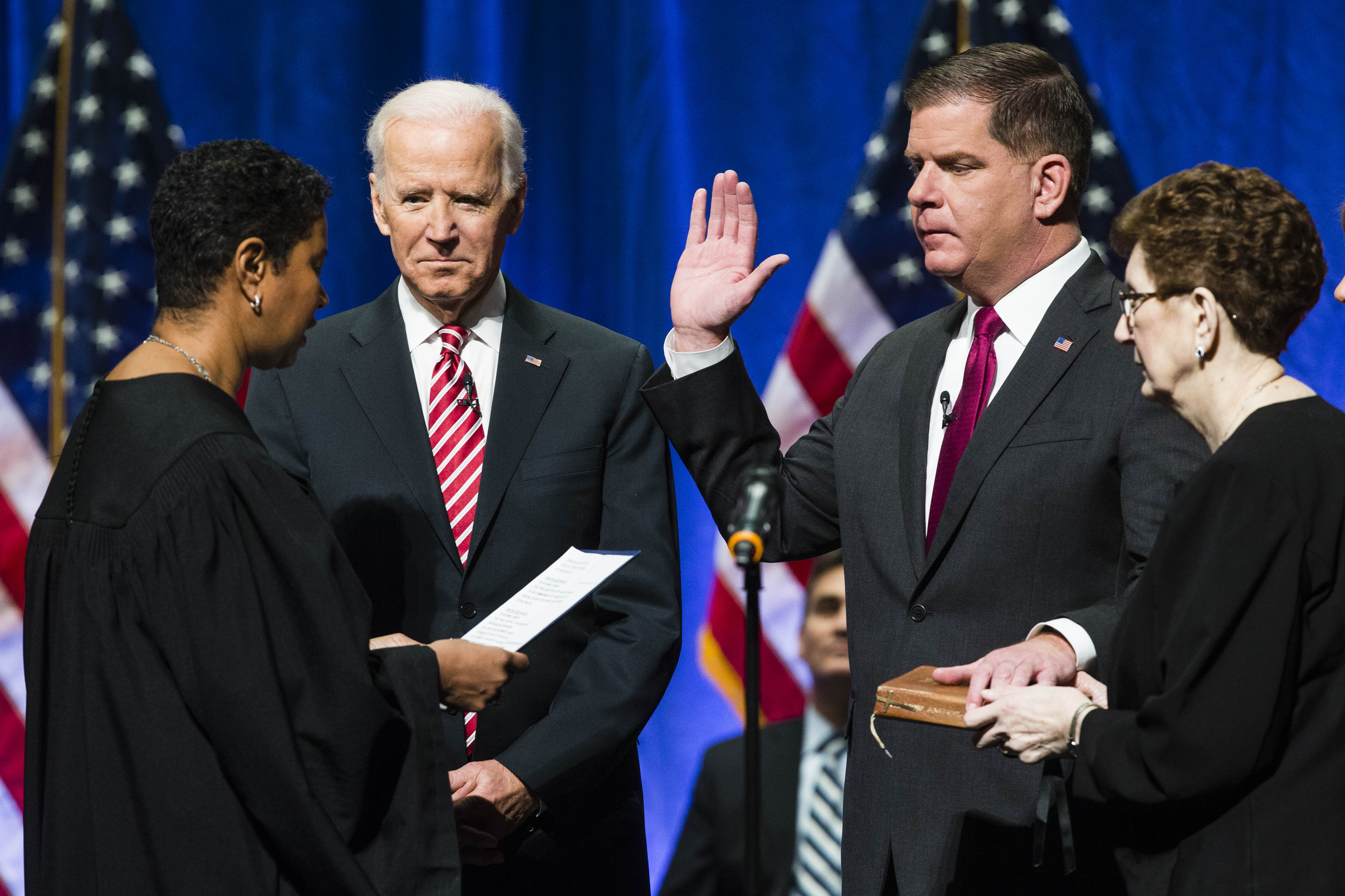 Former vice president Joe Biden was a guest Monday to Walsh’s swearing-in.
