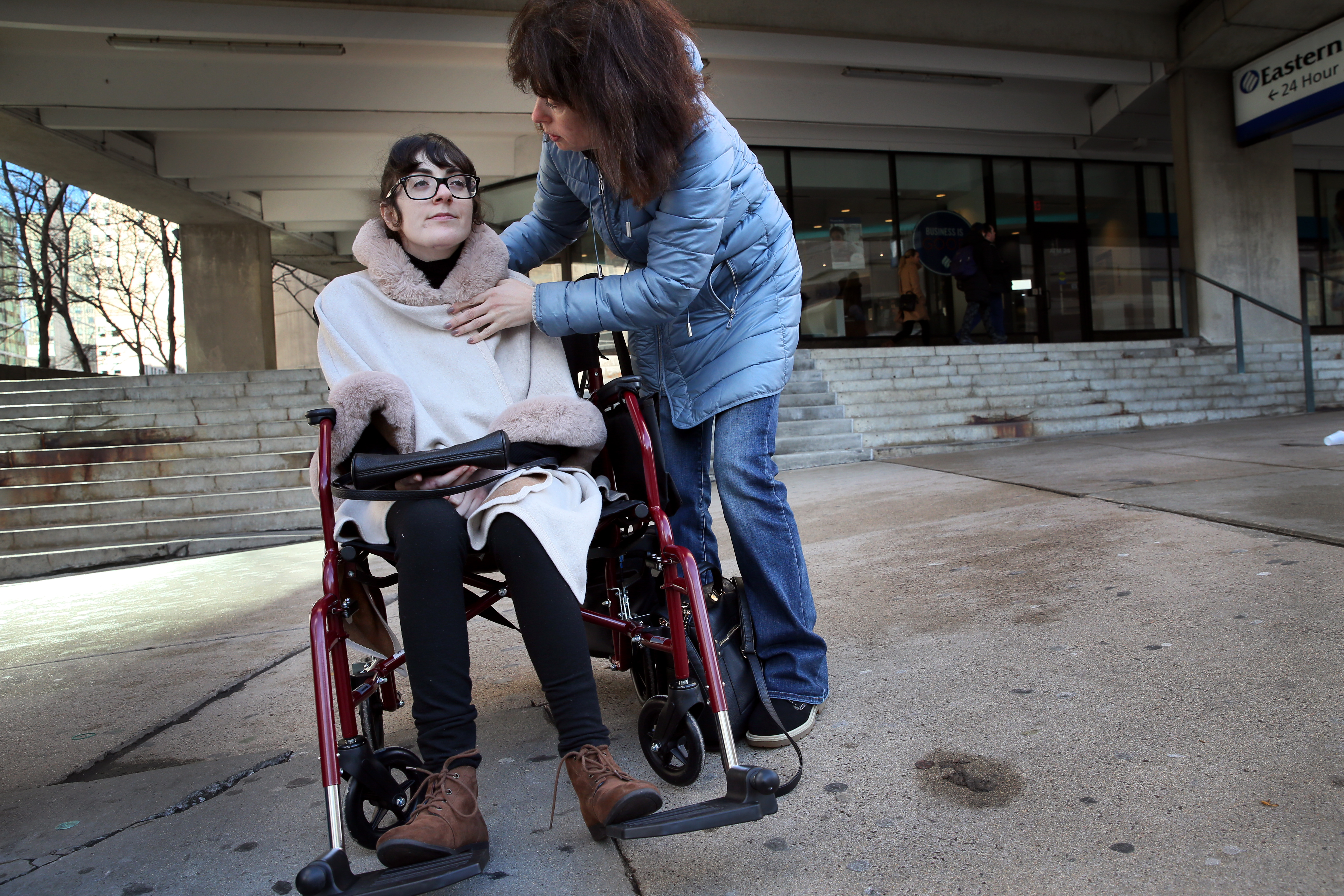 Sonya’s mother, Yelena Lutsker, comforted her daughter. As the weeks passed after the accident, Sonya was able to move from her hospital bed to a wheelchair.