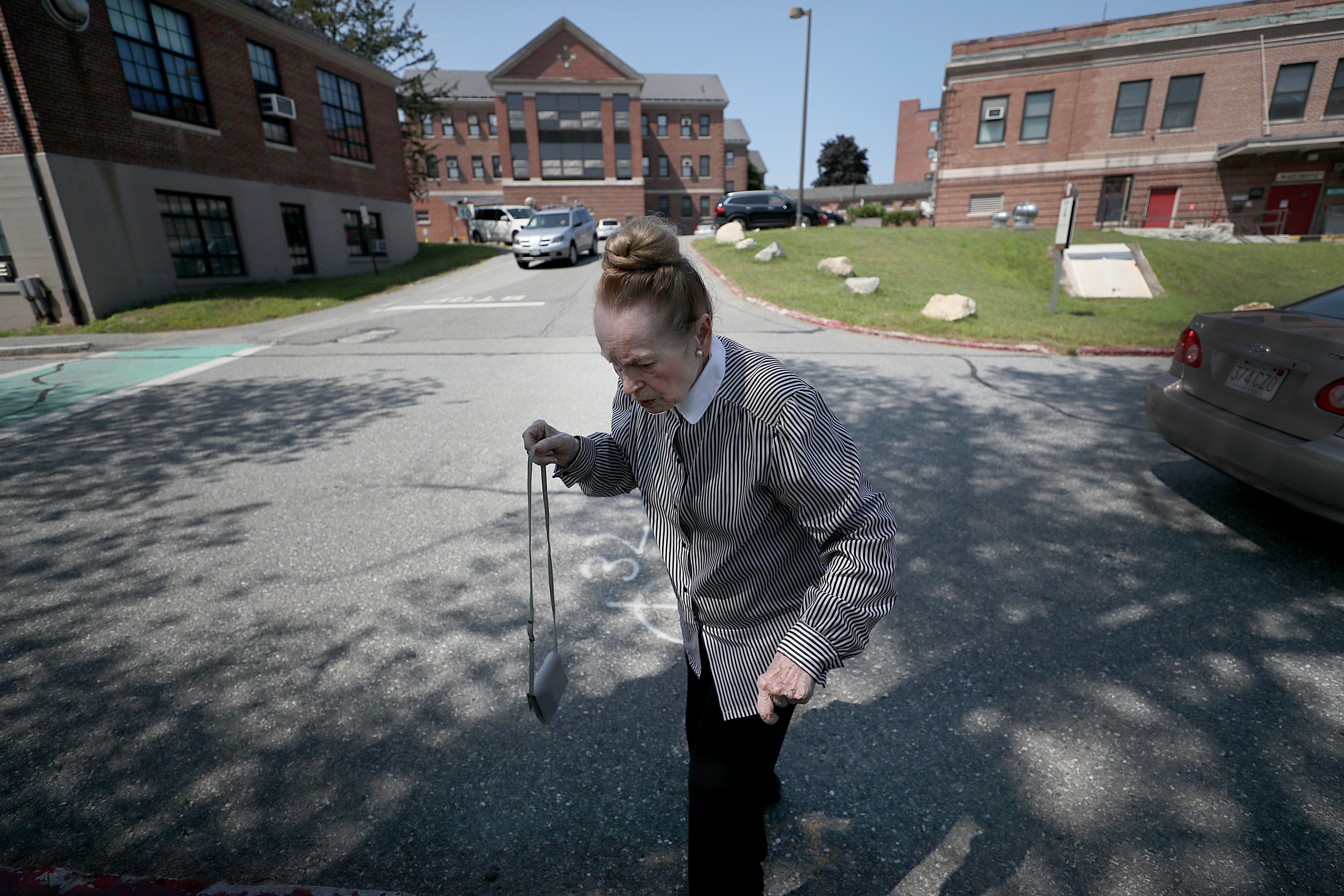 Helga Amidon on the campus of the Bedford VA where her husband, Charles, a highly decorated veteran, is living.