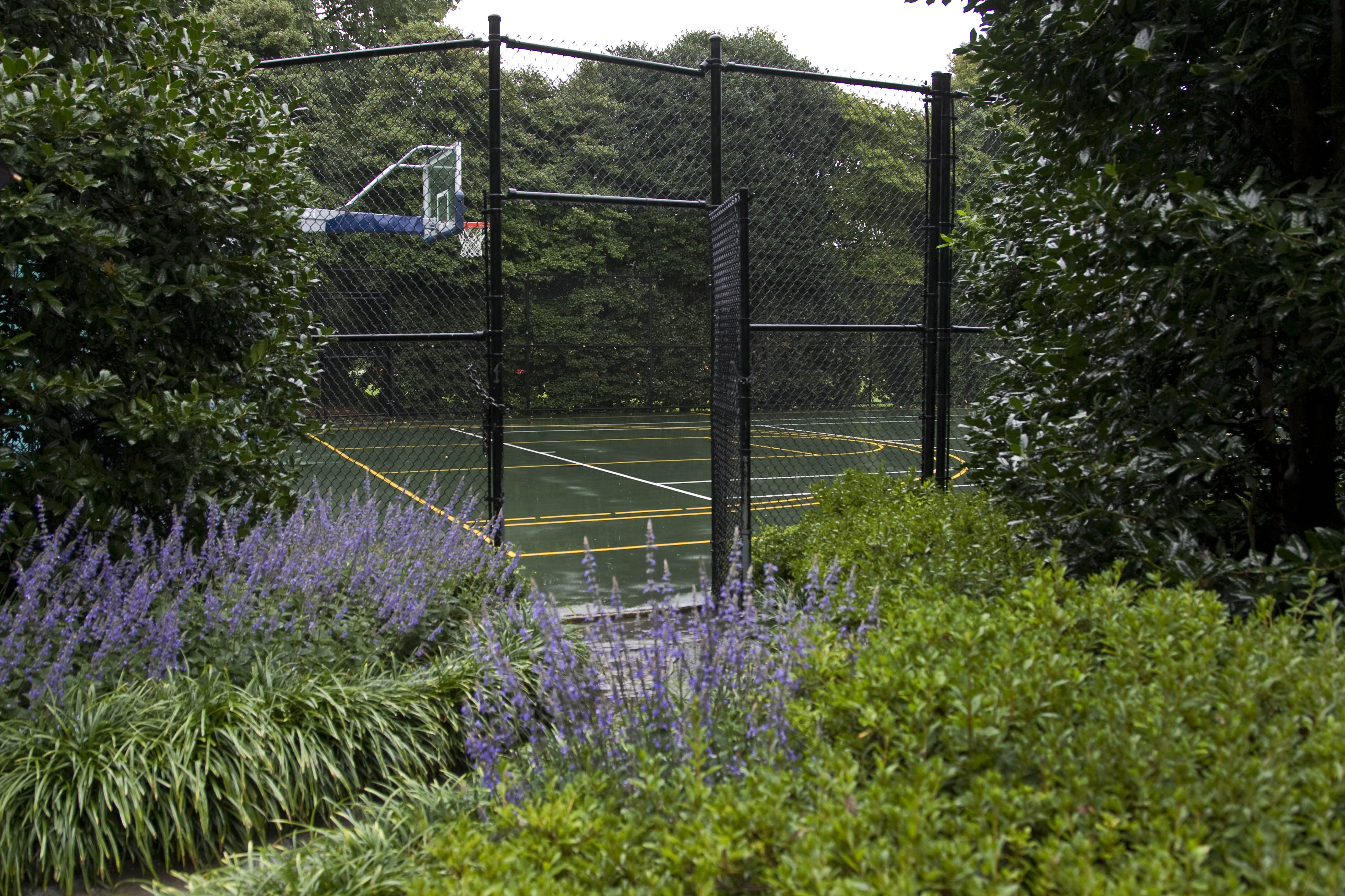 The tennis and basketball court is seen near the Children's Garden at the White House.